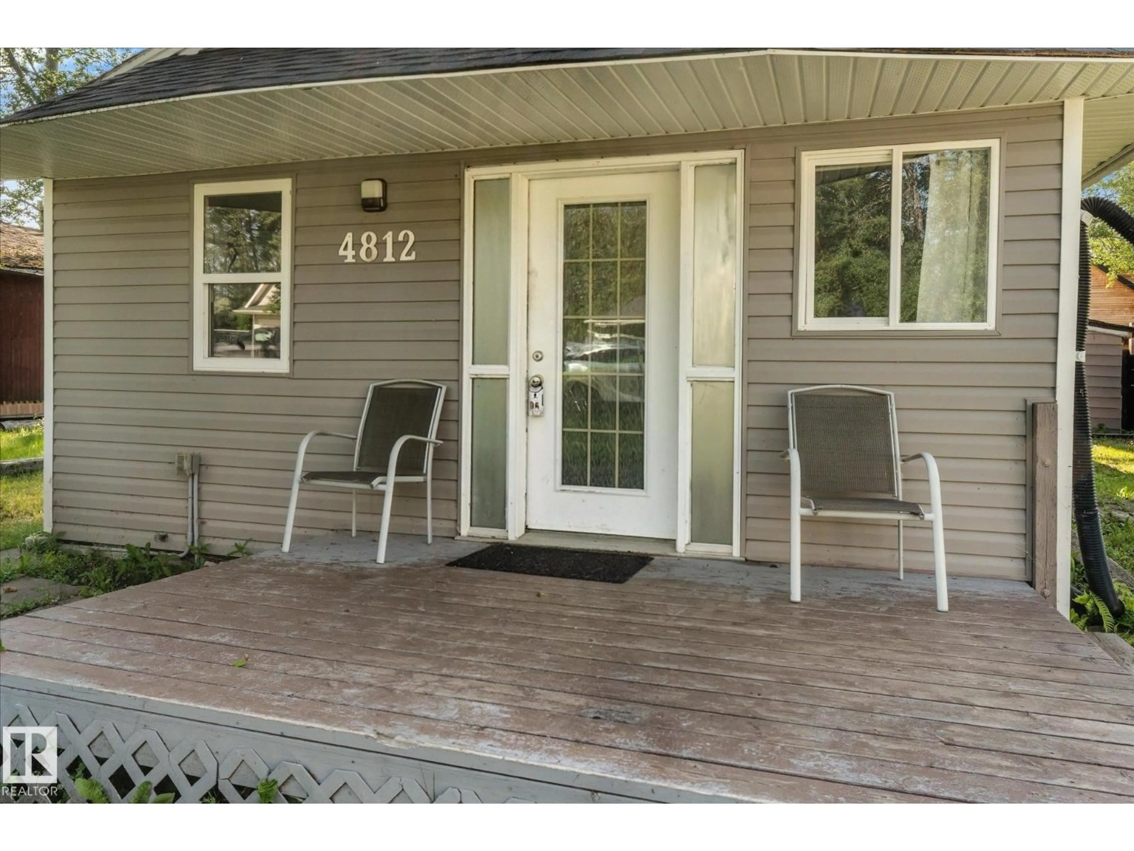 Home with vinyl exterior material, street for 4812 59 ST, Rural Lac Ste. Anne County Alberta T0E0A0