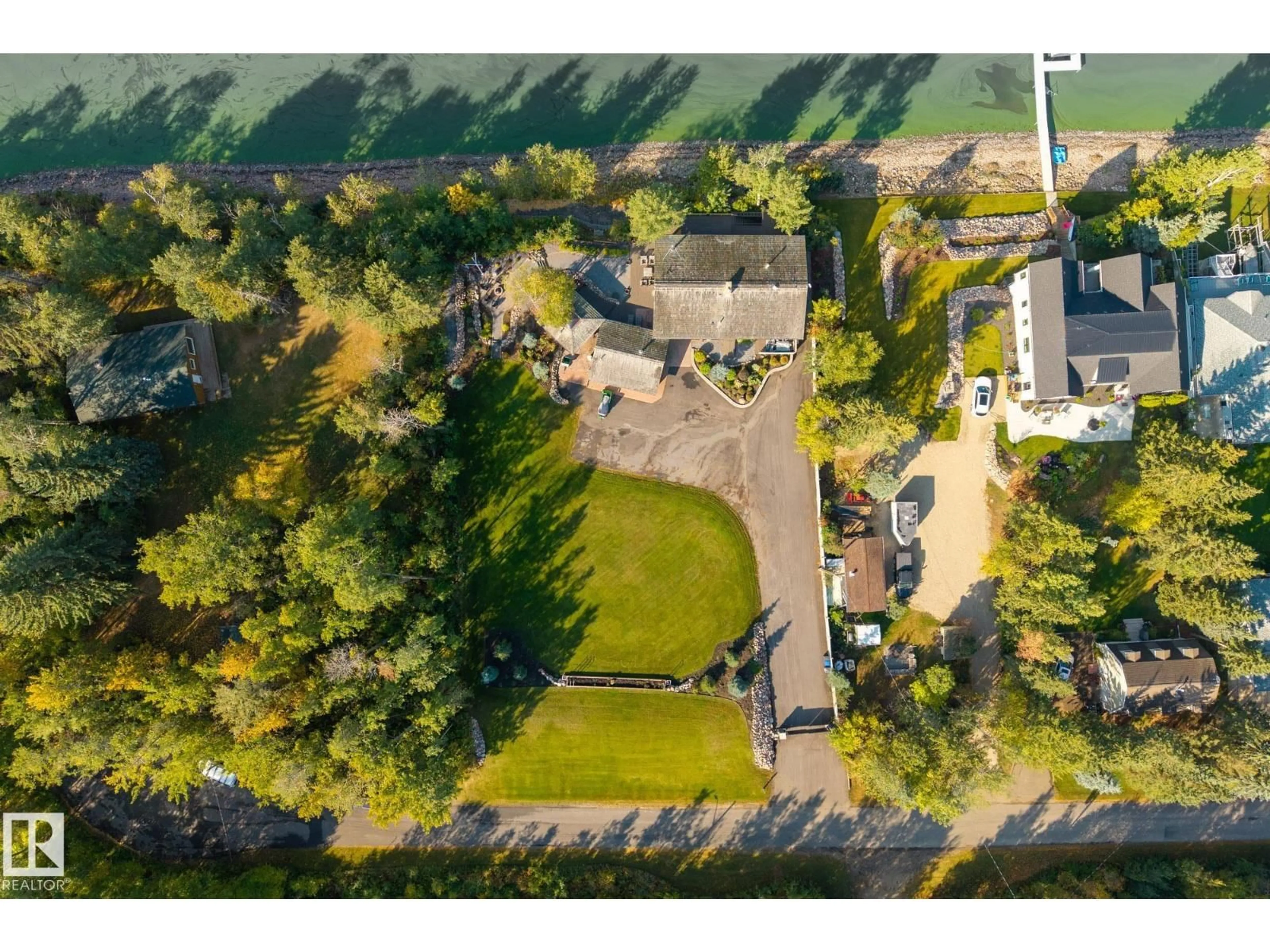 A pic from outside/outdoor area/front of a property/back of a property/a pic from drone, street for 139 SILVER BEACH RD, Rural Wetaskiwin County Alberta T0C2C0
