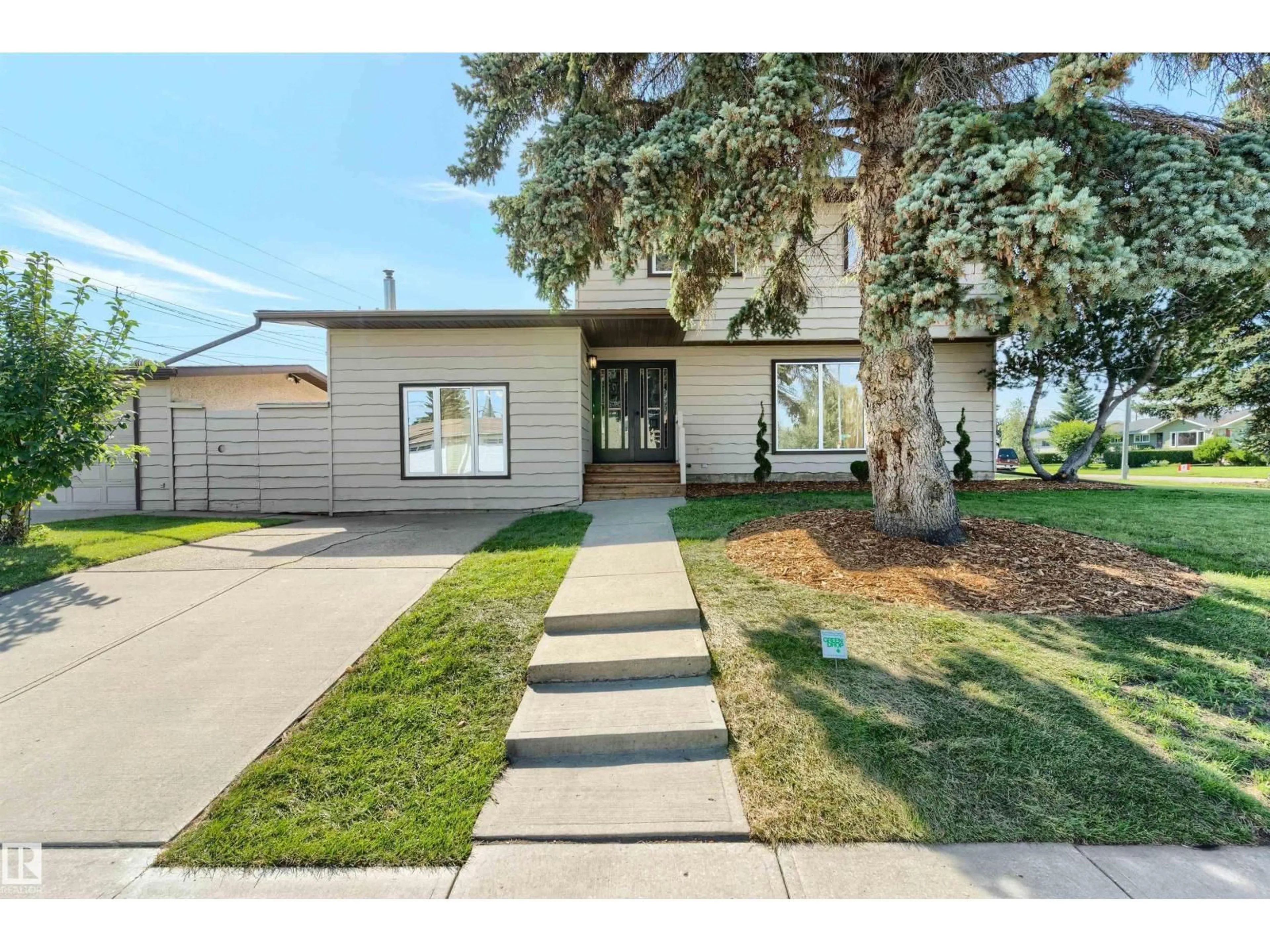 Home with vinyl exterior material, street for 9328 168 ST, Edmonton Alberta T5R2W3
