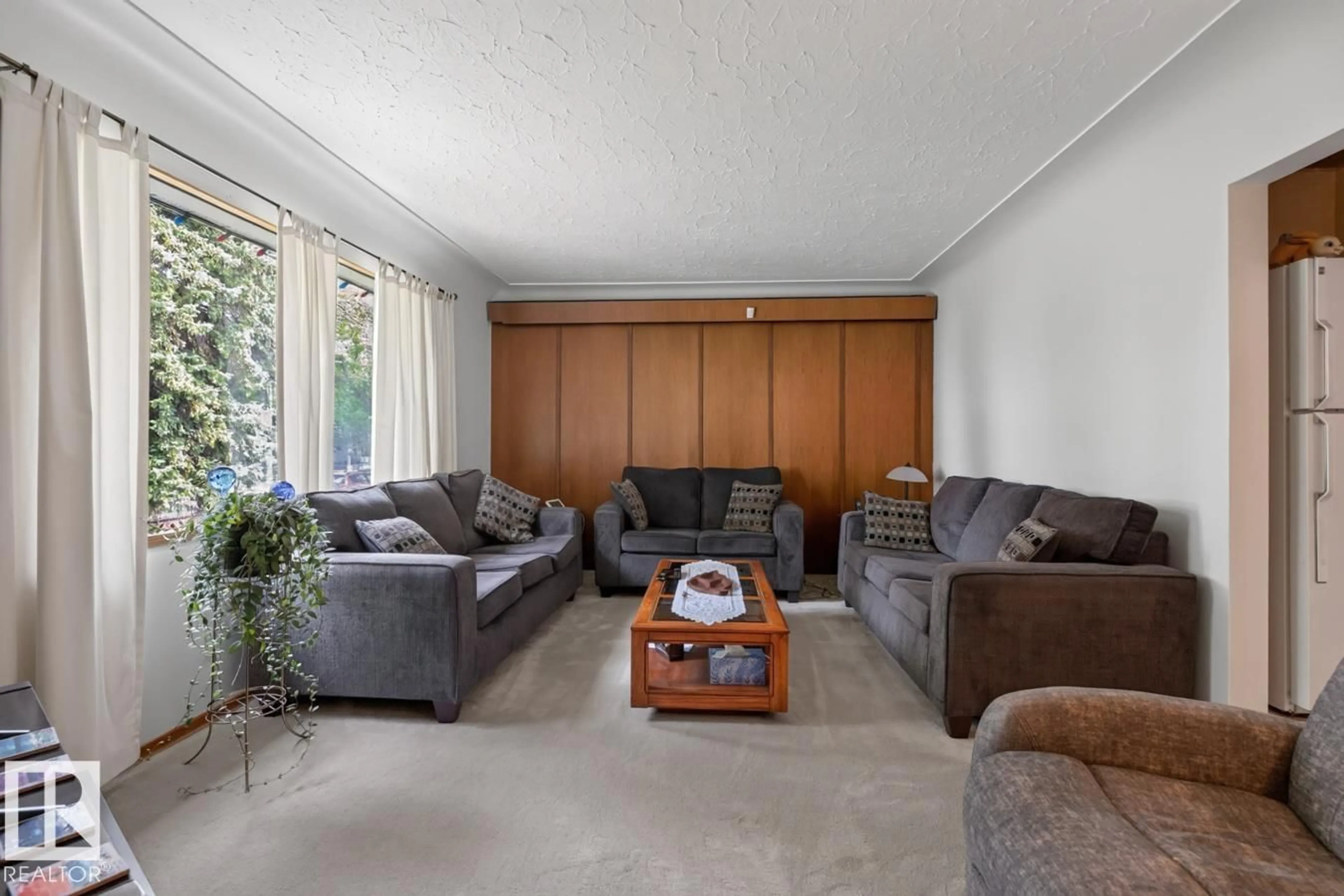 Living room with furniture, unknown for NW - 9419 65 AV, Edmonton Alberta T6E0K1
