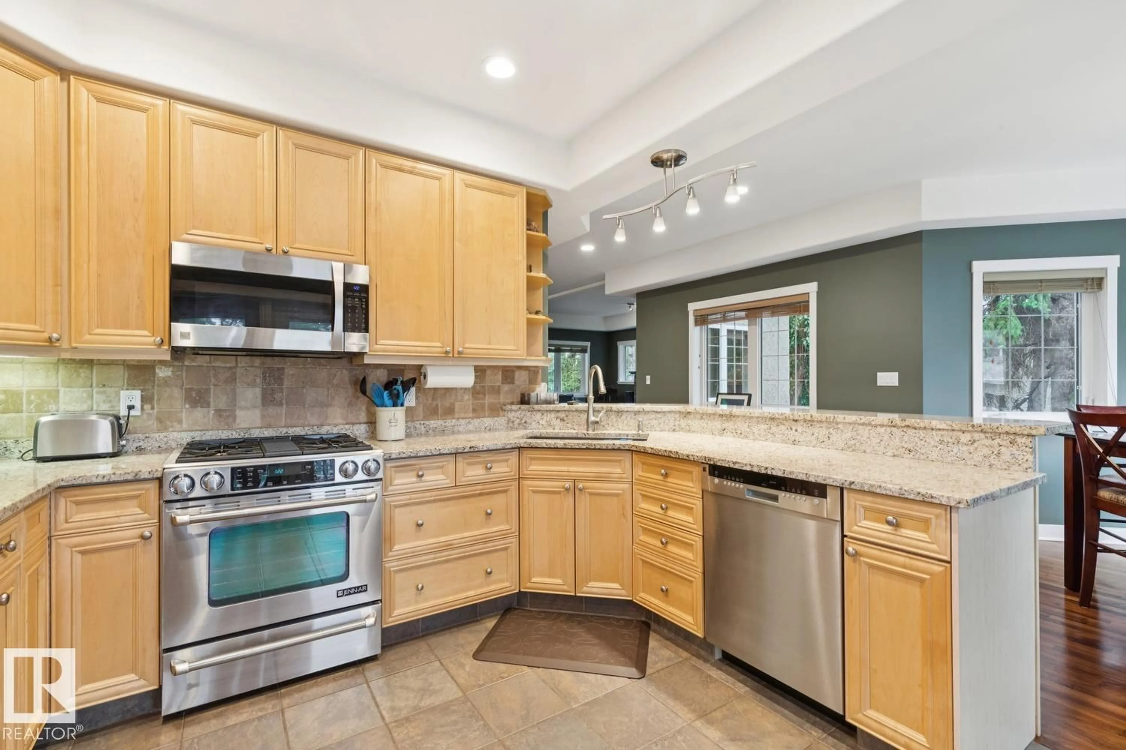 Open concept kitchen, ceramic/tile floor for NW - 11030 122 ST, Edmonton Alberta T5M0B3