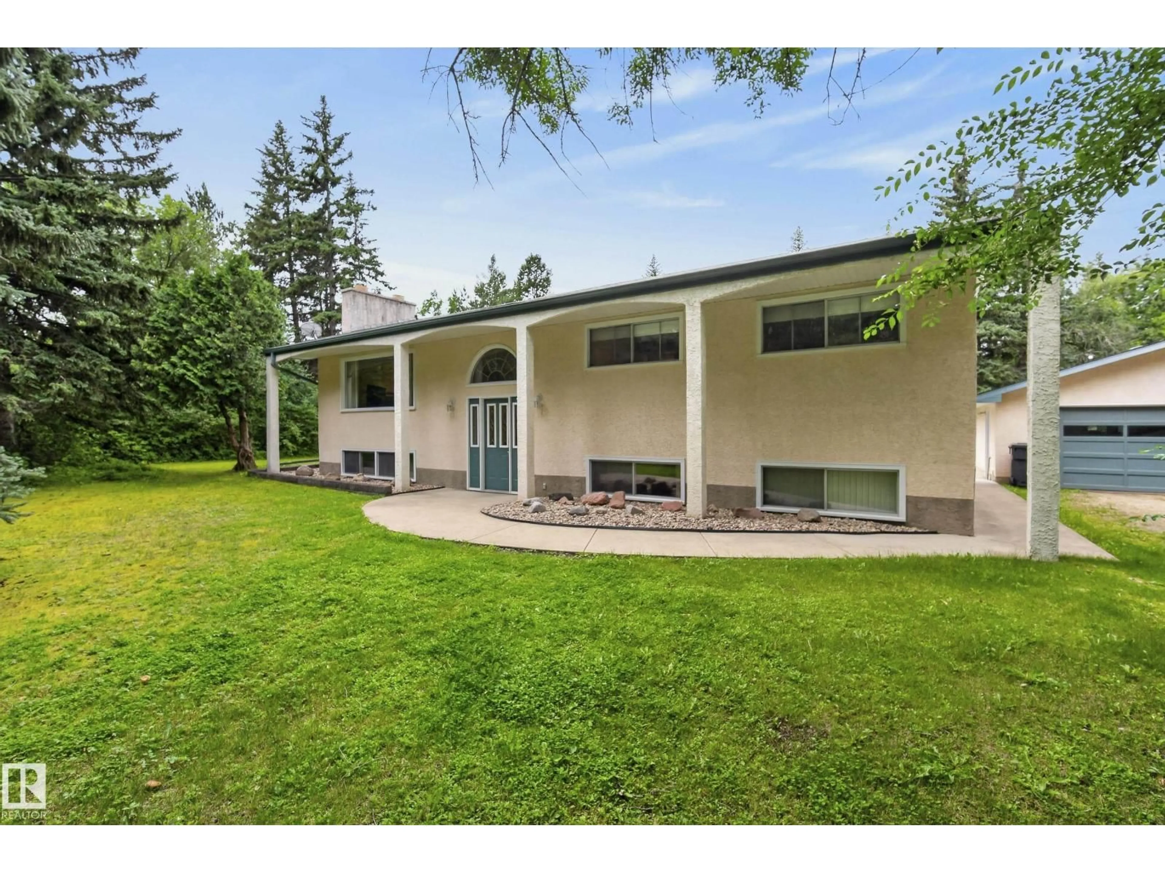 A pic from outside/outdoor area/front of a property/back of a property/a pic from drone, unknown for #6 - 25012 STURGEON RD, Rural Sturgeon County Alberta T8T0C3