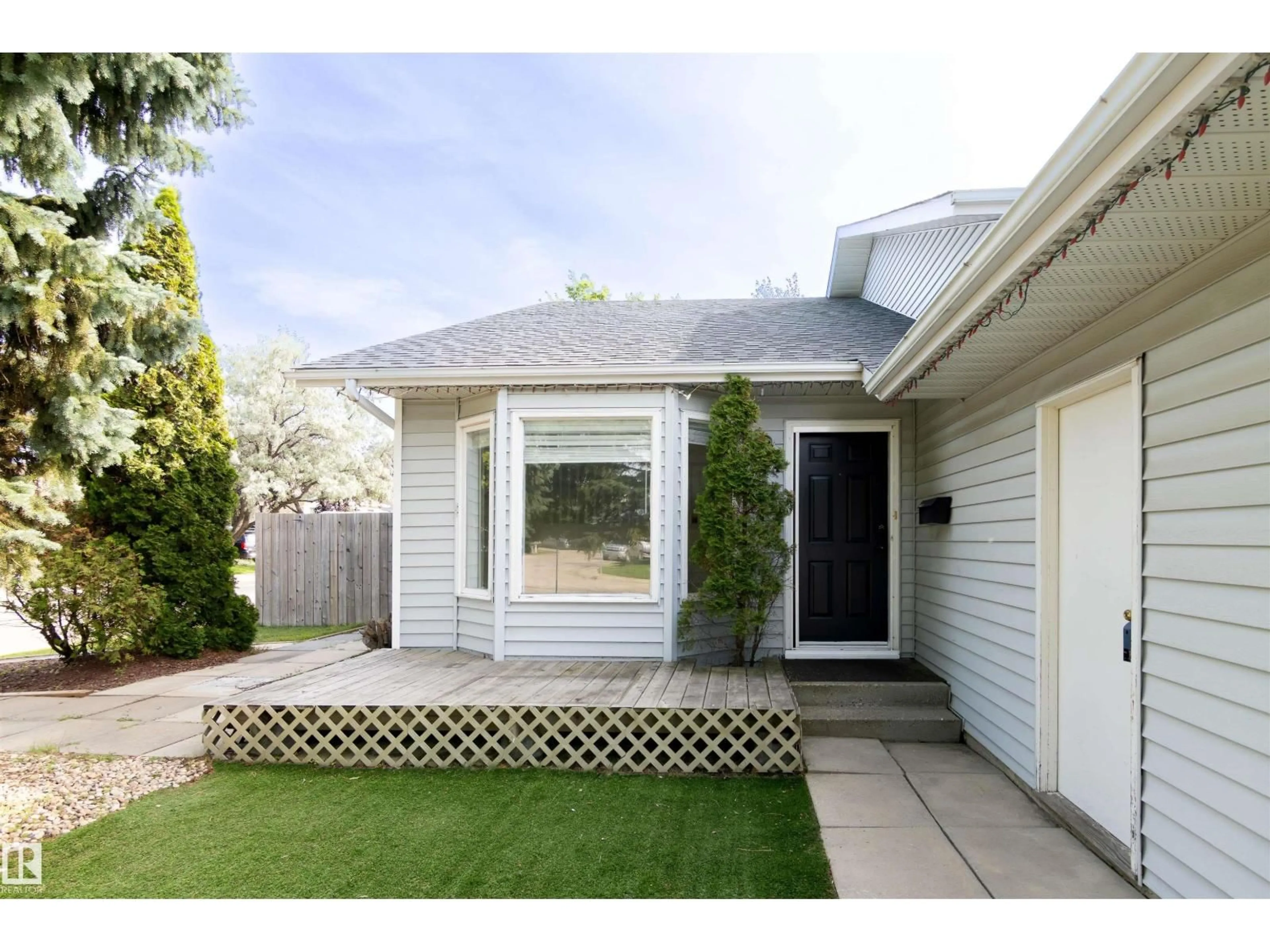 Home with vinyl exterior material, street for NW - 4903 11A AV, Edmonton Alberta T6L6C6