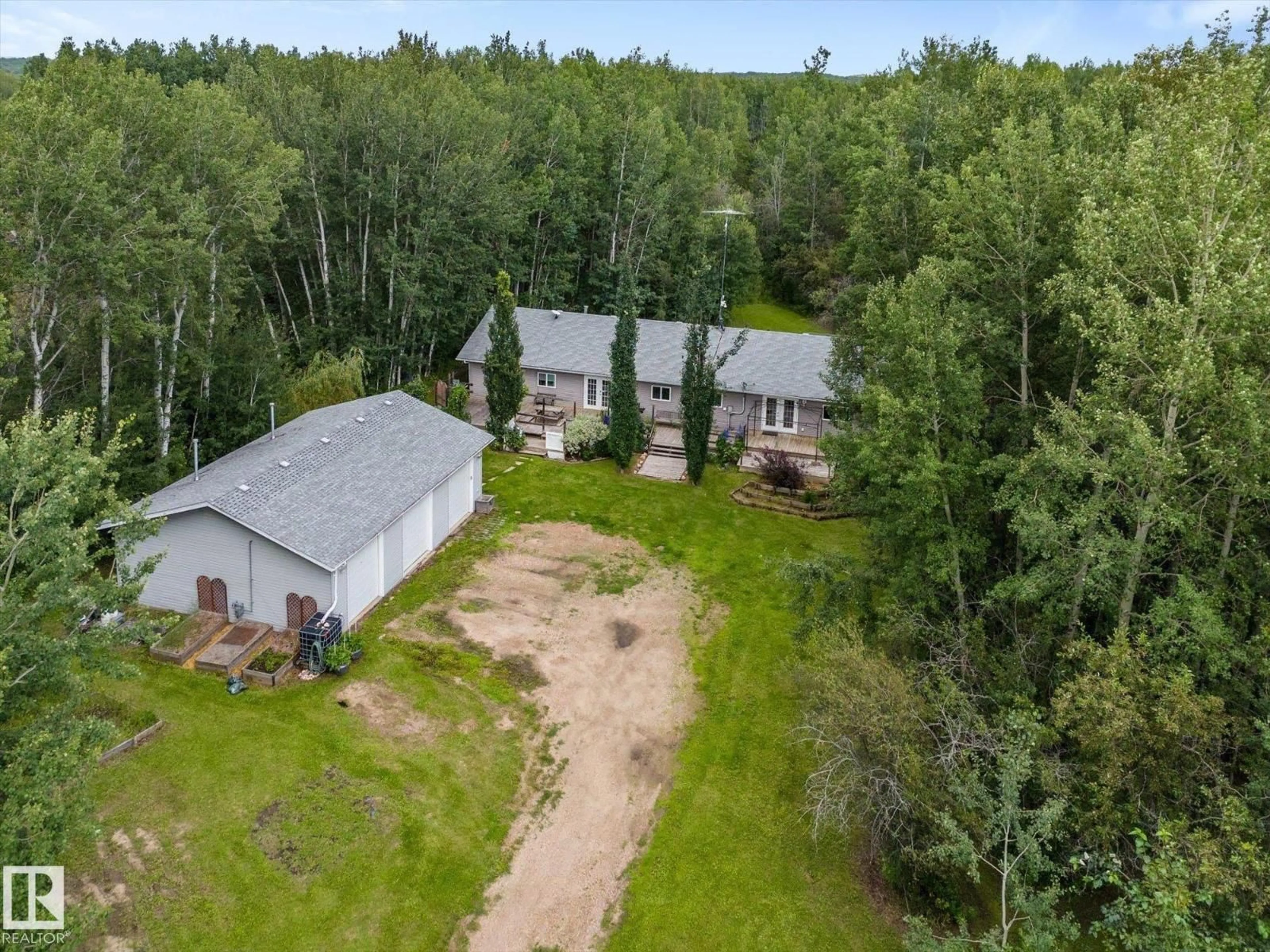 A pic from outside/outdoor area/front of a property/back of a property/a pic from drone, unknown for 52414 - 20 RGE ROAD 30, Rural Parkland County Alberta T7Y2M5