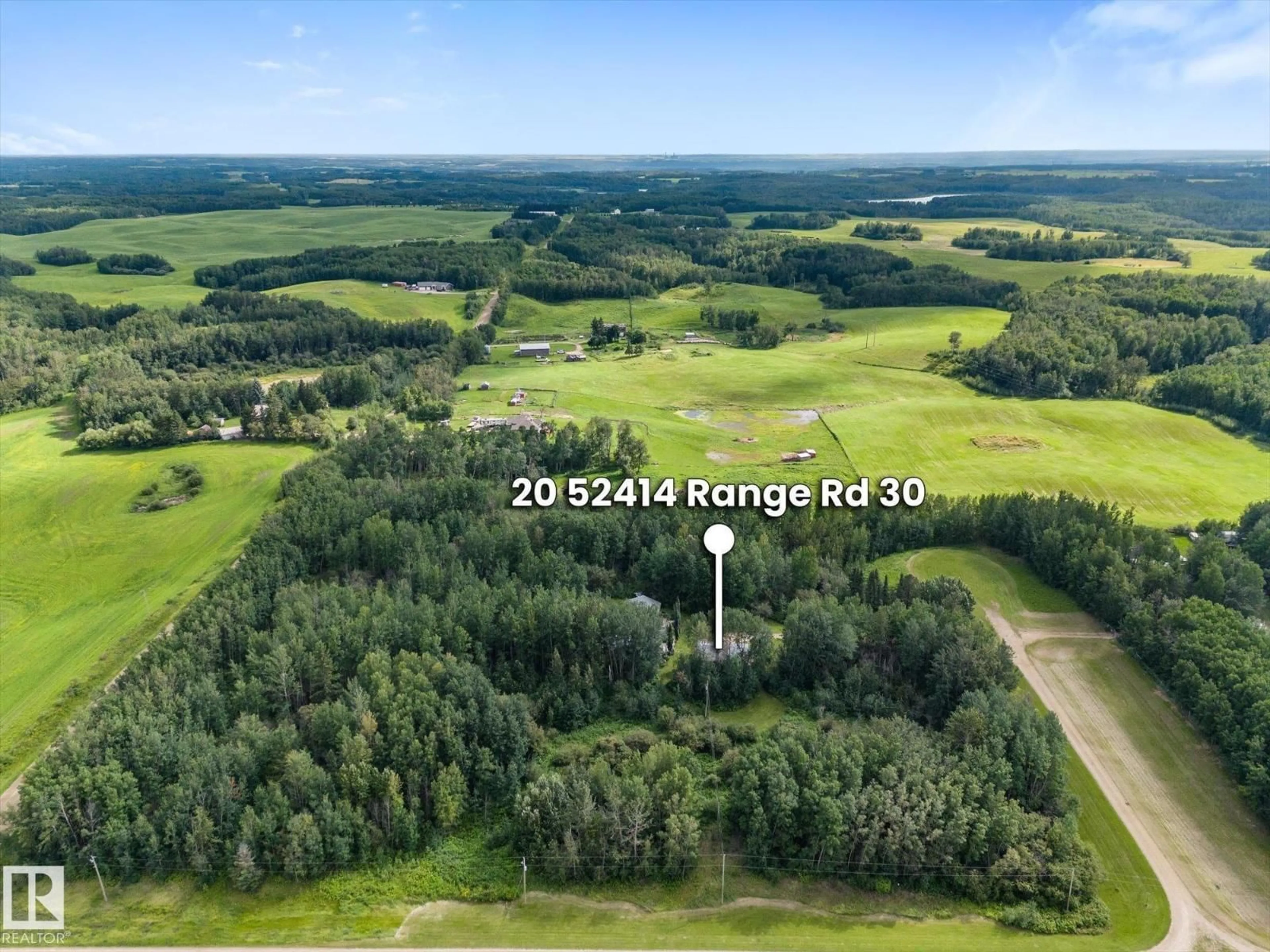 A pic from outside/outdoor area/front of a property/back of a property/a pic from drone, forest/trees view for 52414 - 20 RGE ROAD 30, Rural Parkland County Alberta T7Y2M5