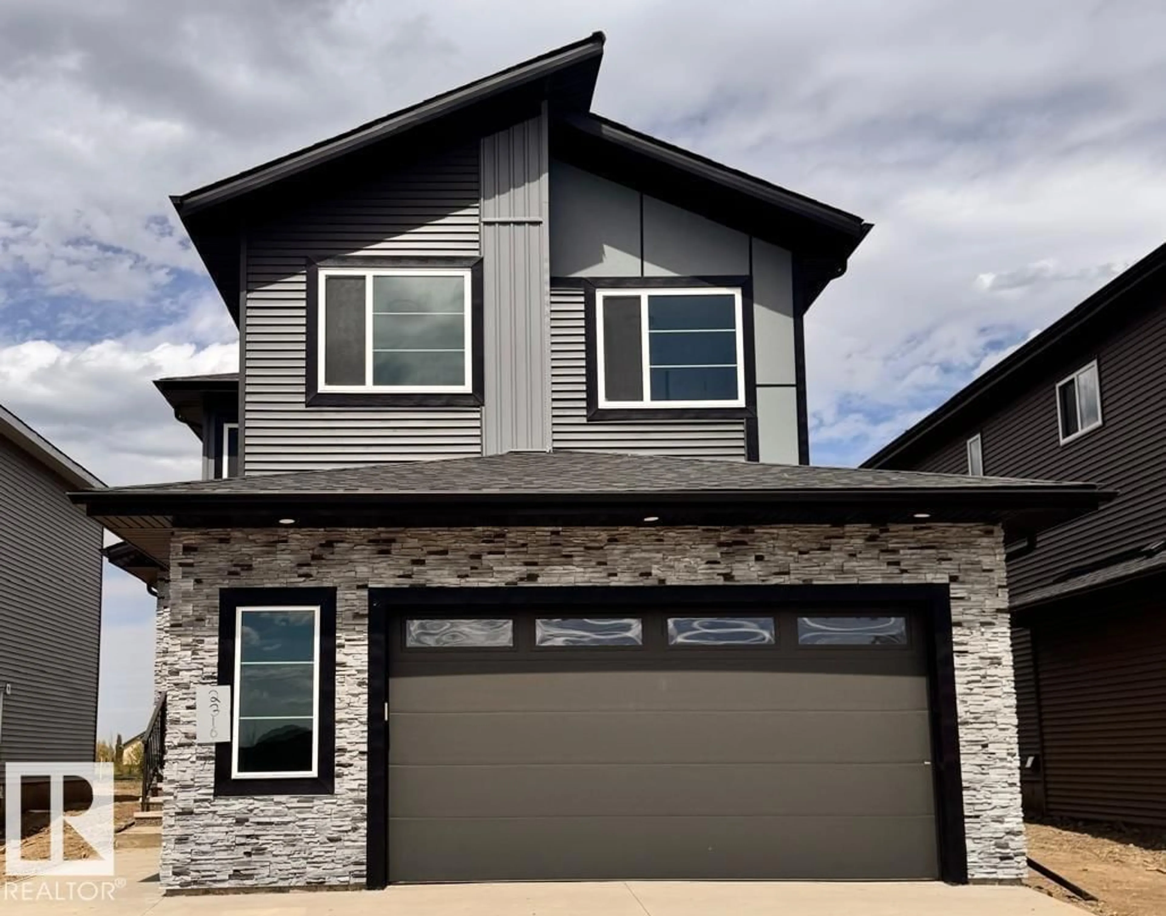Home with vinyl exterior material, street for NE - 2316 63 AV, Rural Leduc County Alberta T4X3A4