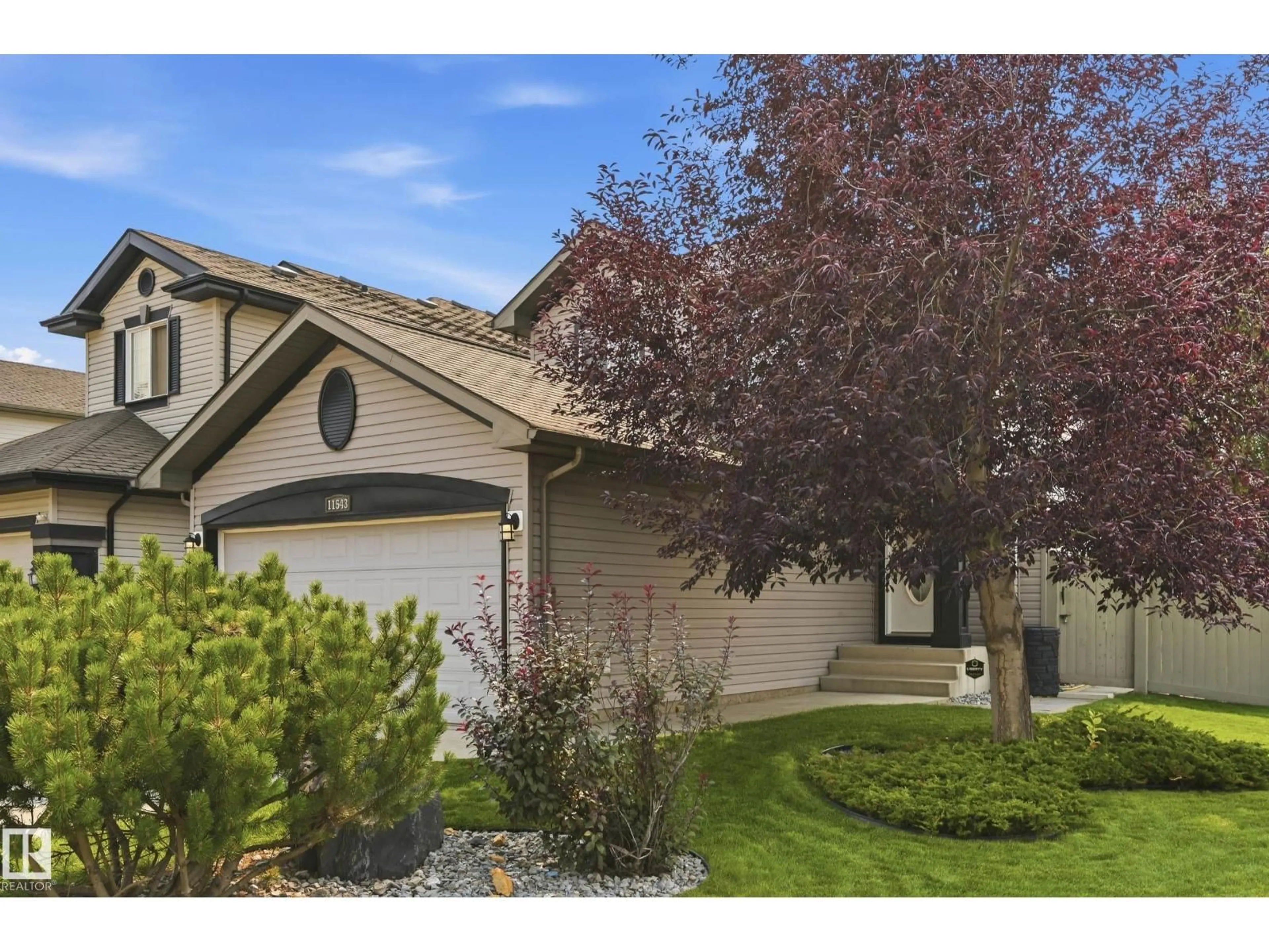 Home with vinyl exterior material, street for SW - 11543 11 AV, Edmonton Alberta T6W1W8