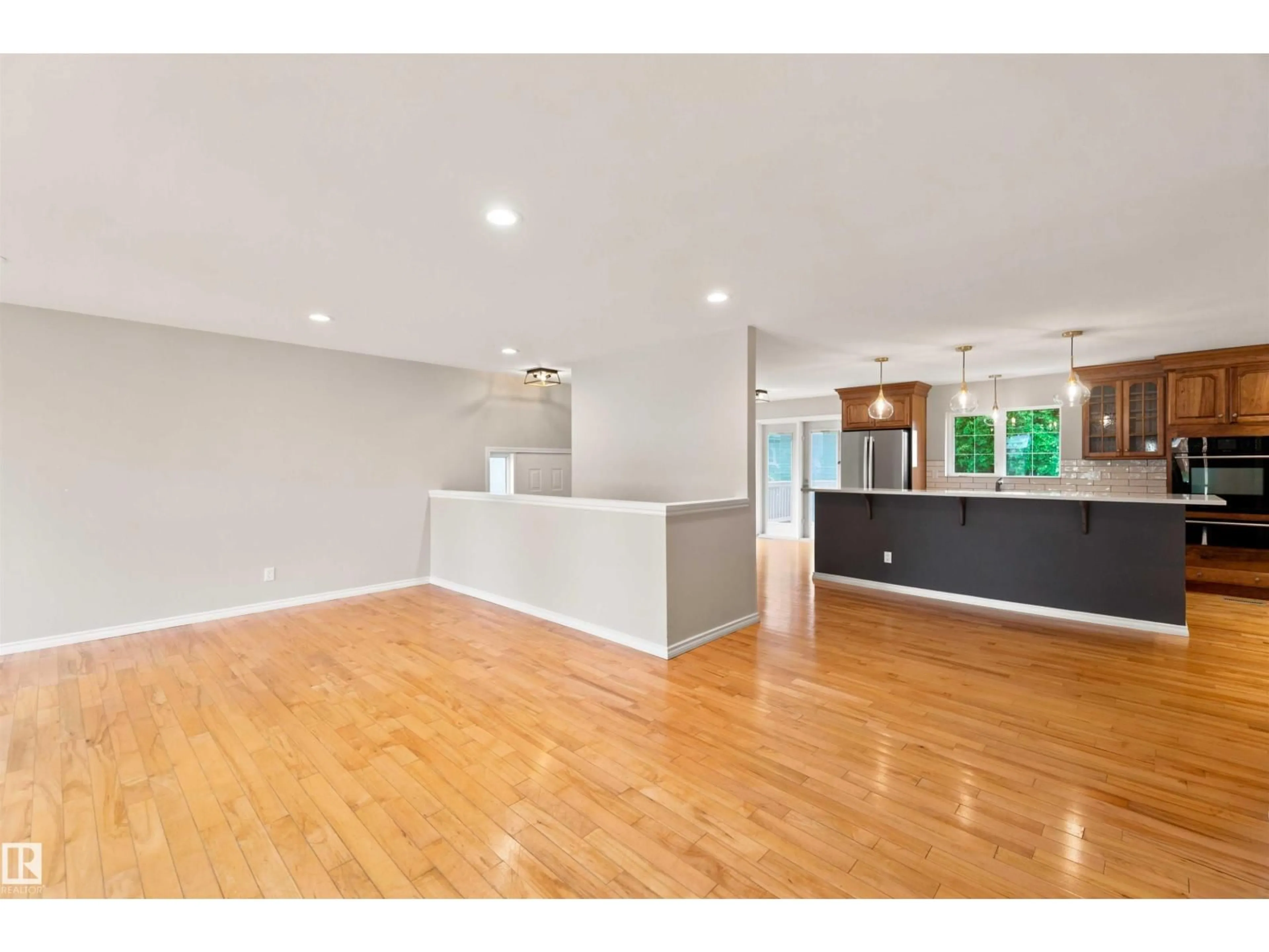 Open concept kitchen, wood/laminate floor for 4414 53A, Smoky Lake Town Alberta T0A3C0
