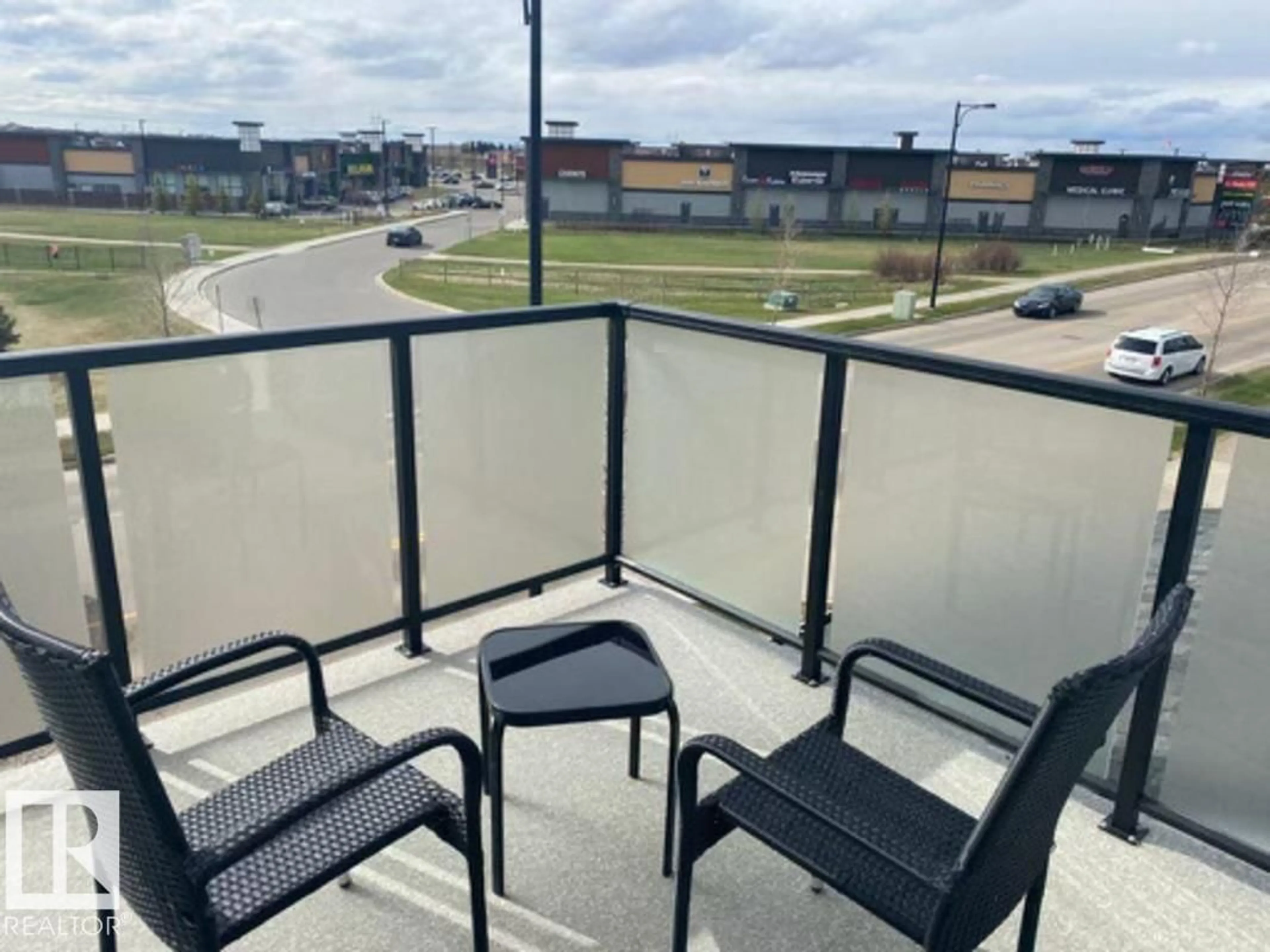 Patio, city buildings view from balcony for #3 - 2905 141 ST, Edmonton Alberta T6W3M4