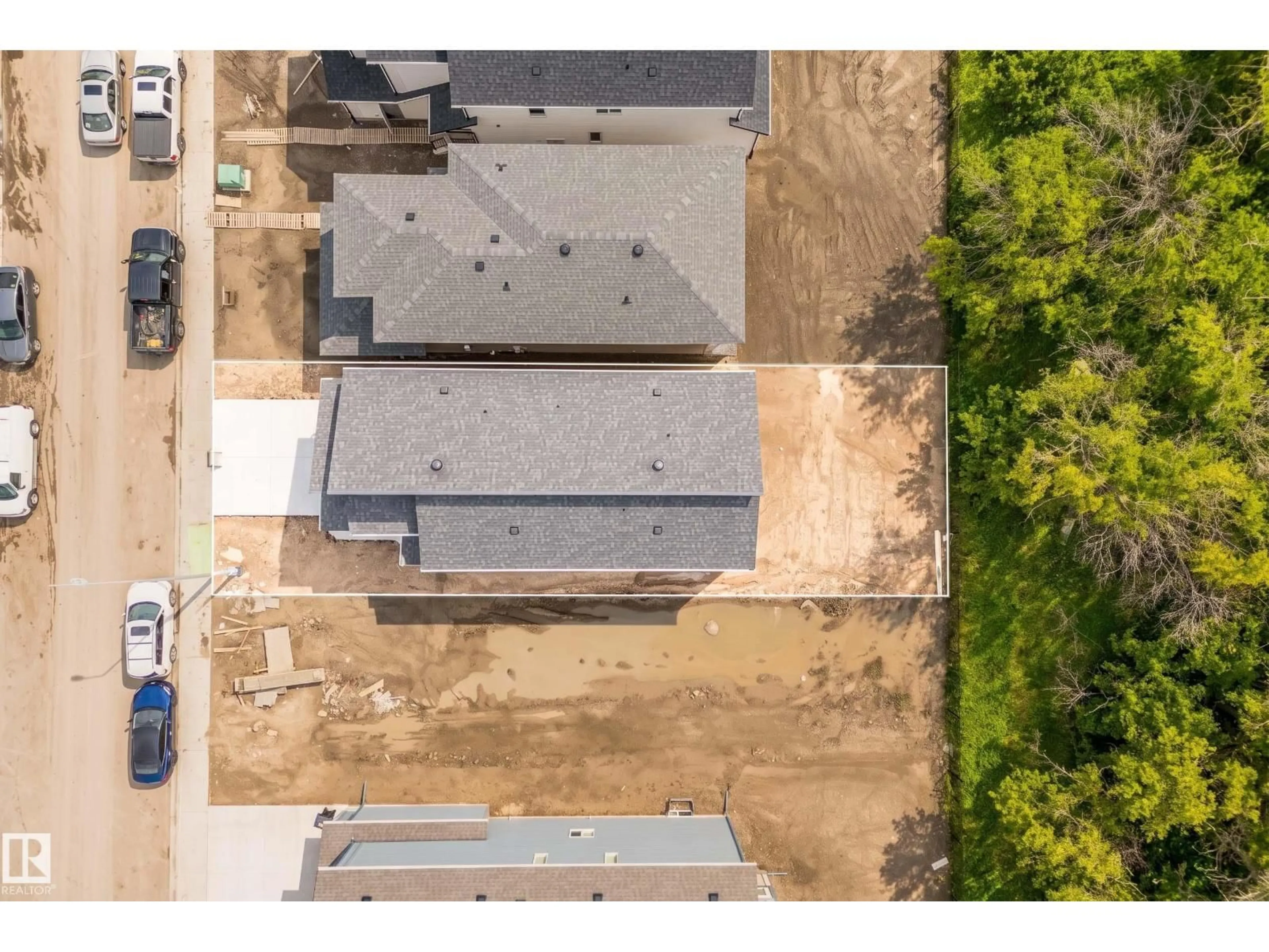 A pic from outside/outdoor area/front of a property/back of a property/a pic from drone, street for NE - 17731 7 ST, Edmonton Alberta T5Y4K3