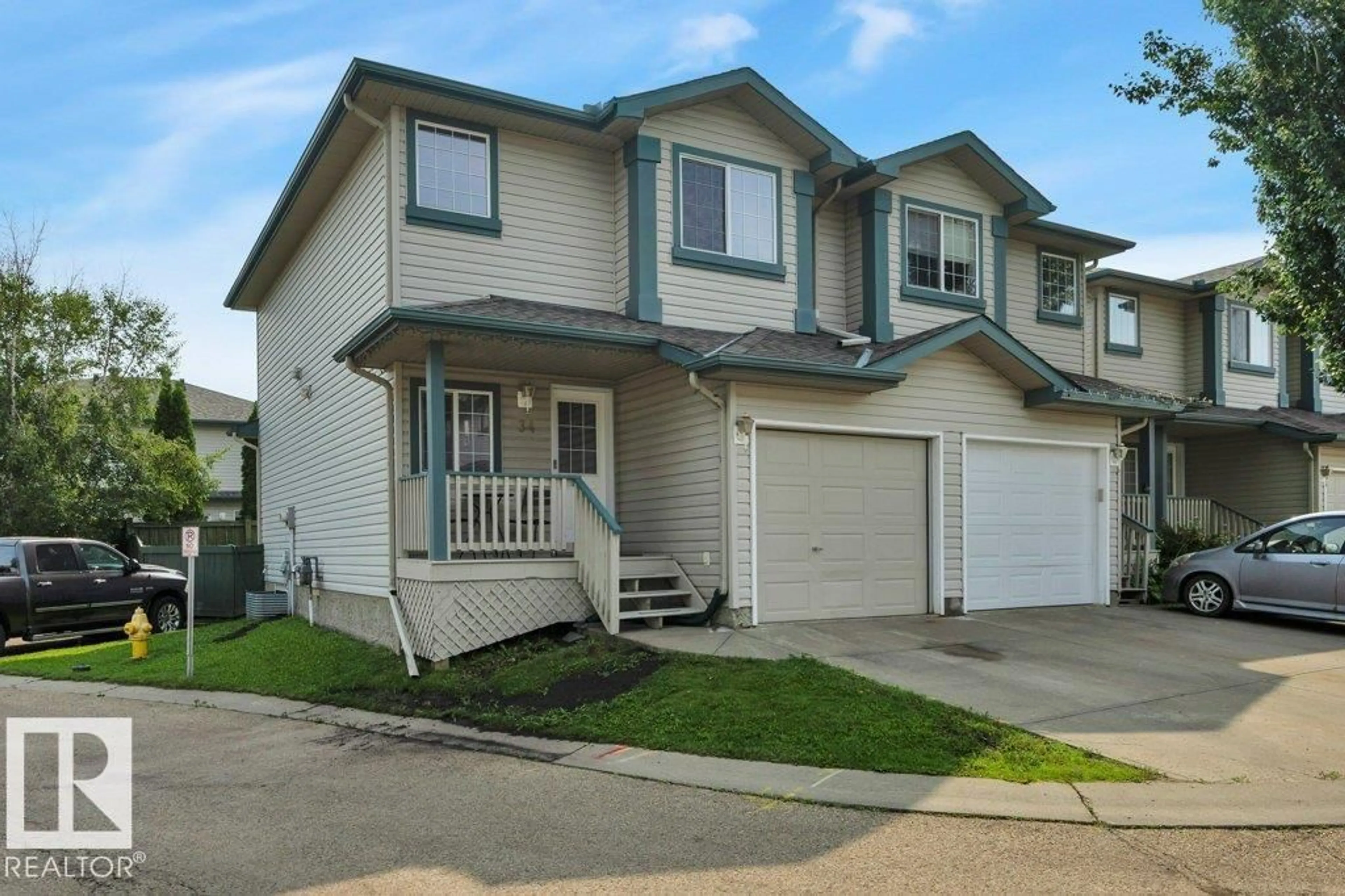 Home with vinyl exterior material, street for #34 - 2004 GRANTHAM CT, Edmonton Alberta T5T3X4