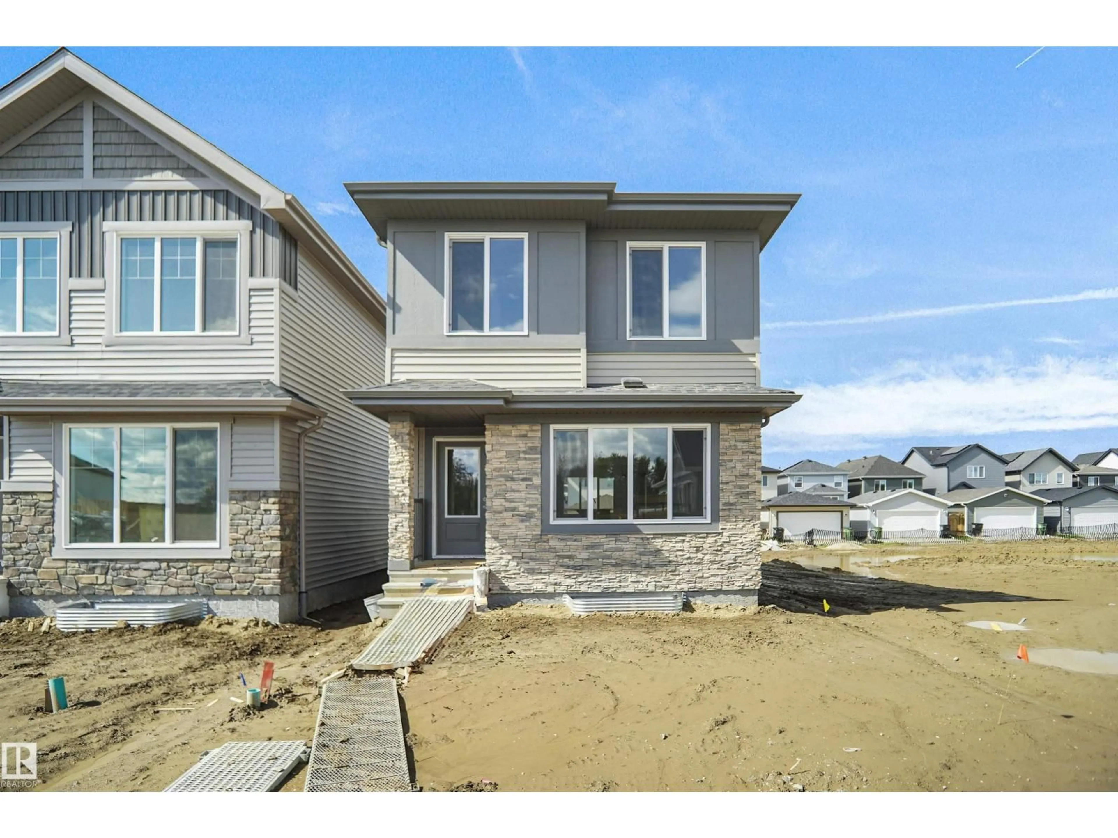 Home with vinyl exterior material, street for 548 ASHGROVE CI, Leduc Alberta T9E0K7