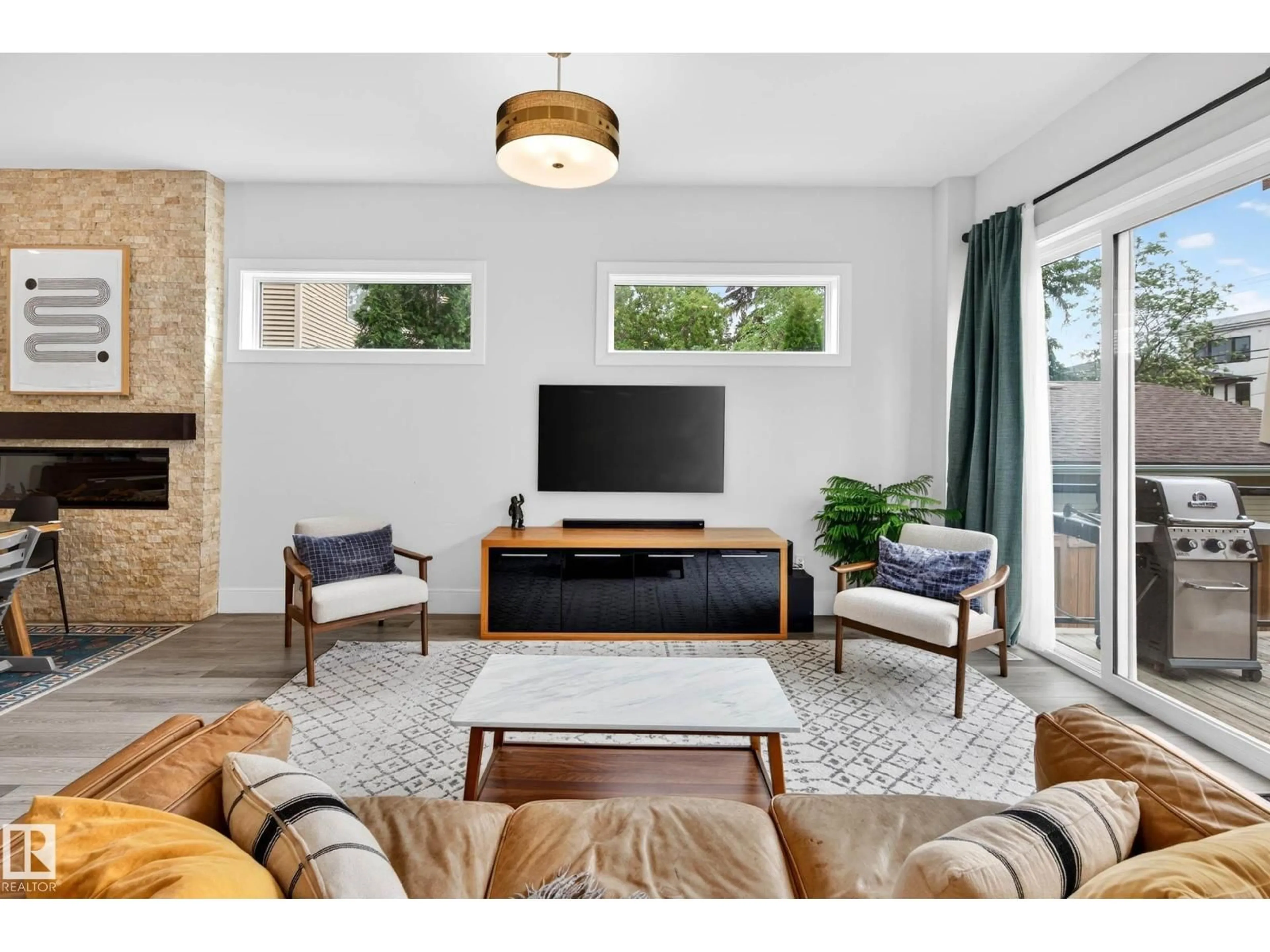 Living room with furniture, unknown for 11743 83 AV, Edmonton Alberta T6G0V2