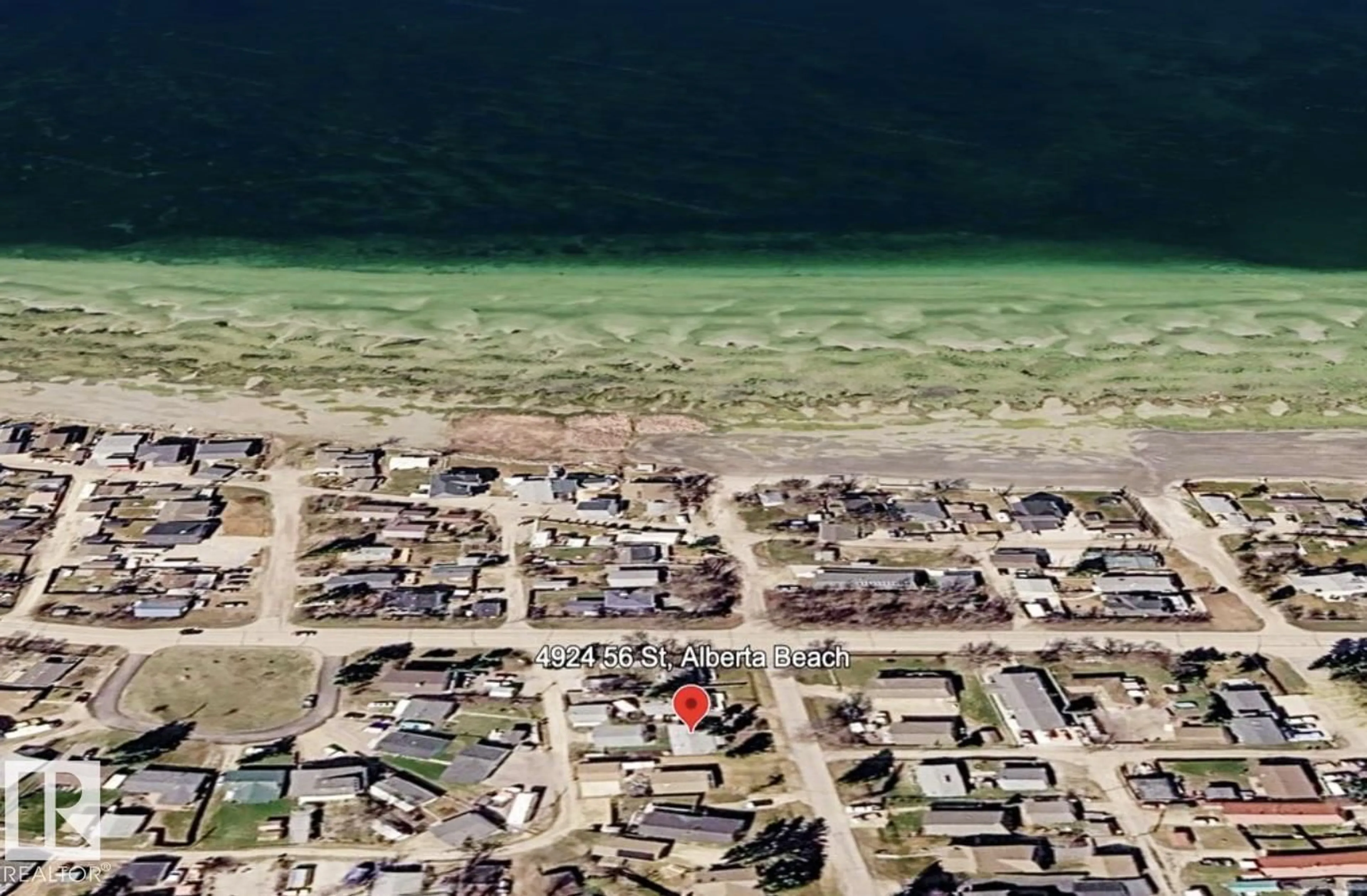 A pic from outside/outdoor area/front of a property/back of a property/a pic from drone, water/lake/river/ocean view for 4924 56 ST, Rural Lac Ste. Anne County Alberta T5Z3Y3