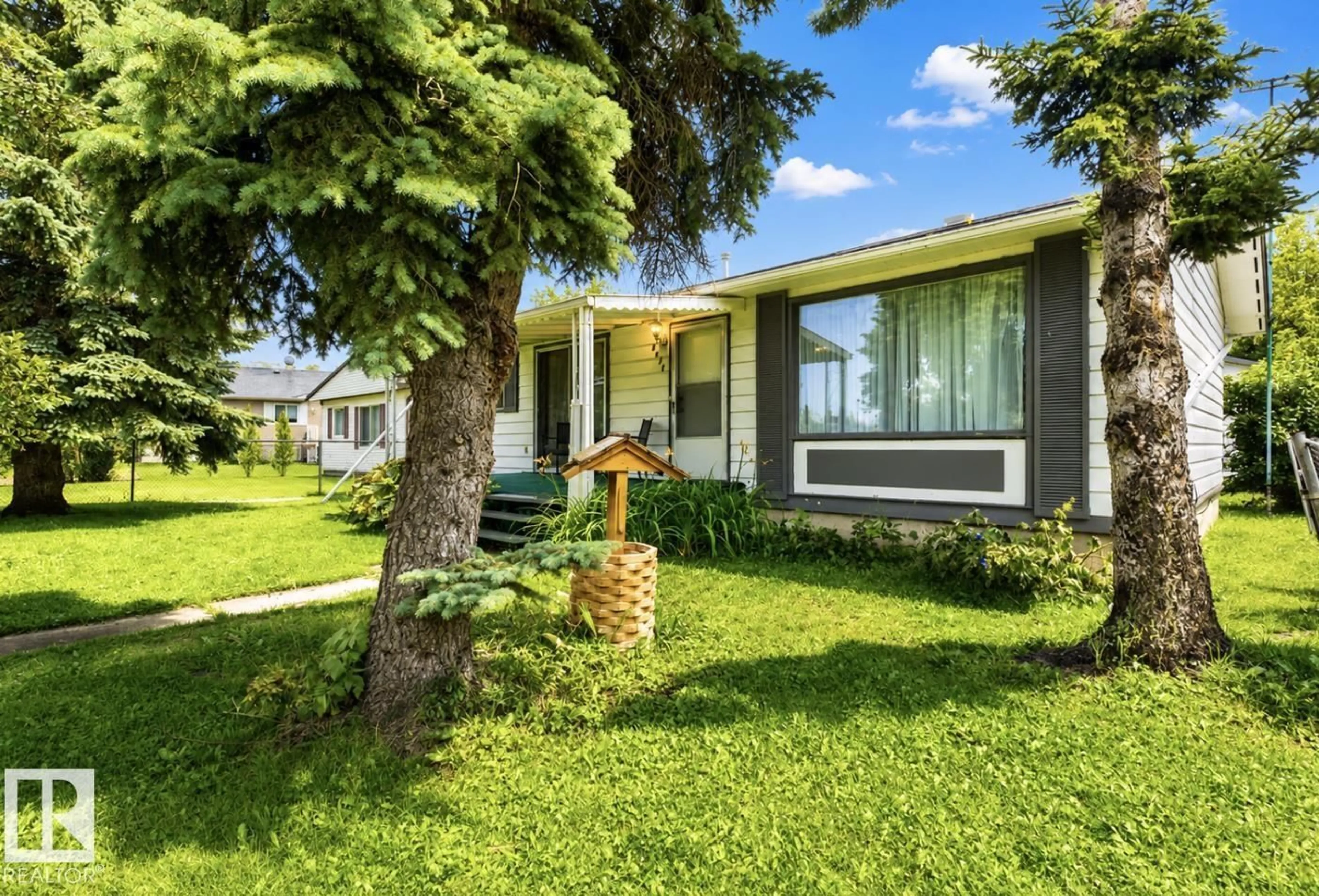 Home with vinyl exterior material, street for 4924 56 ST, Rural Lac Ste. Anne County Alberta T5Z3Y3