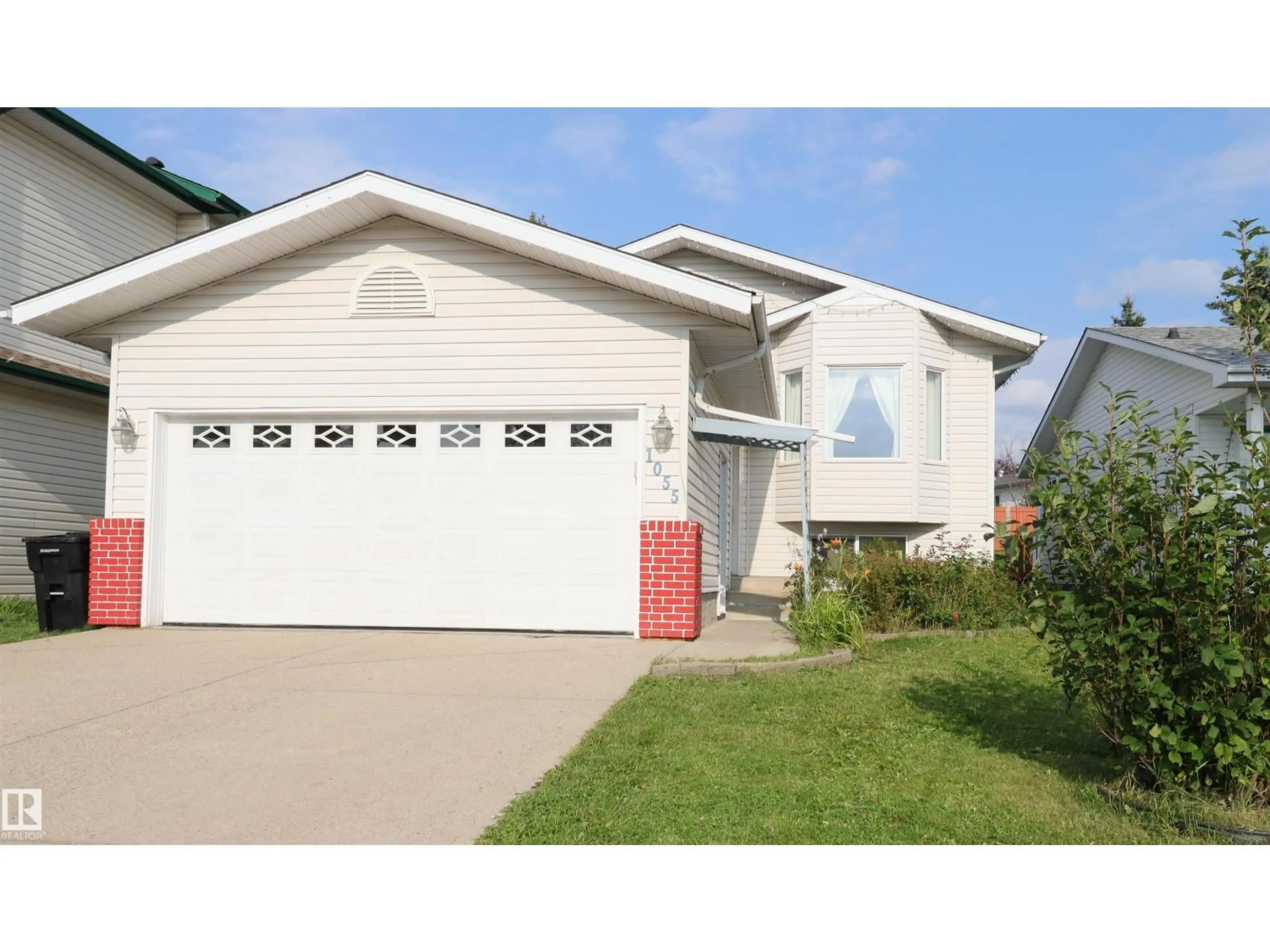 Home with vinyl exterior material, street for 1055 JONES CR, Edmonton Alberta T6L6Y1