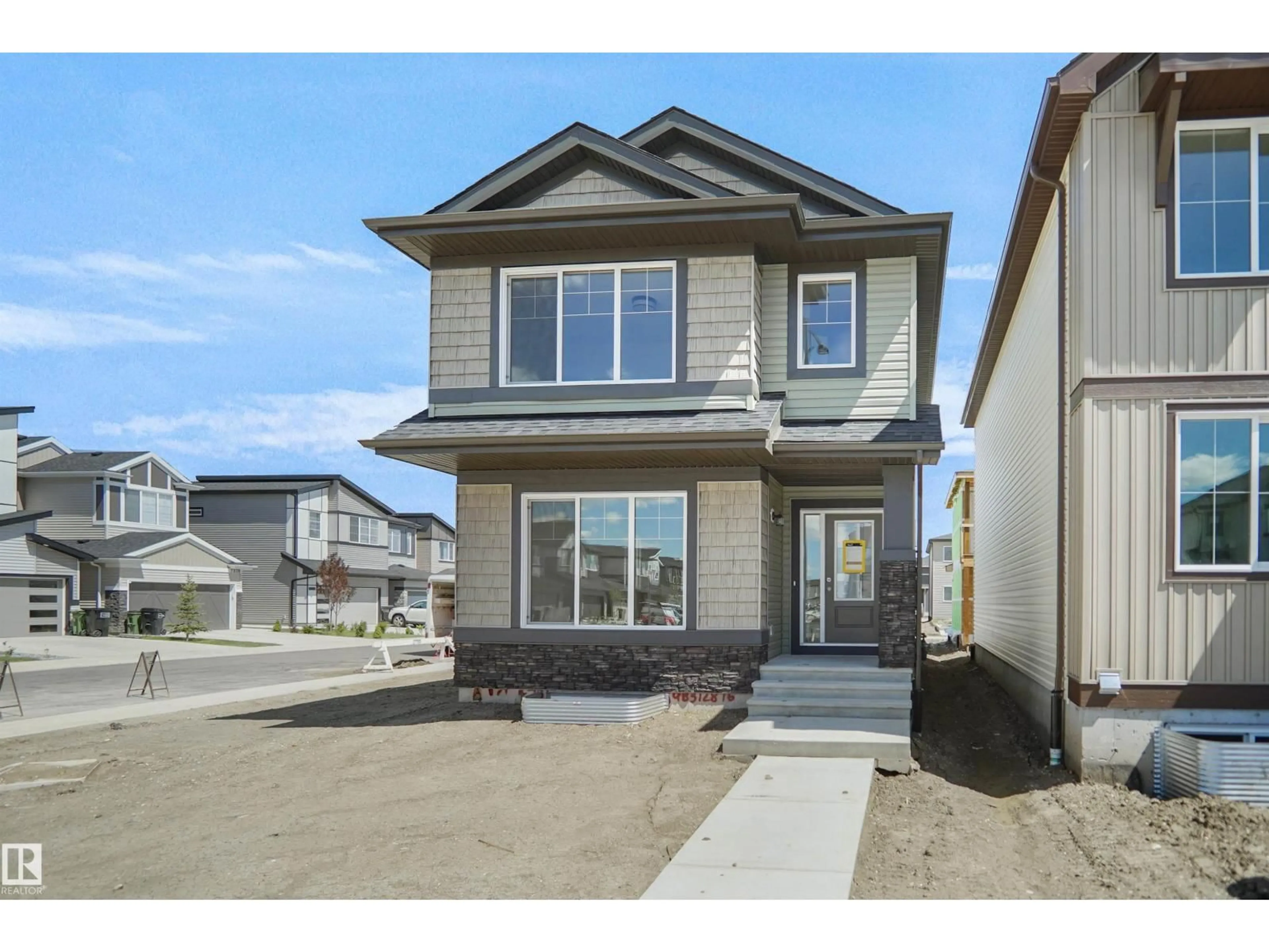 Home with vinyl exterior material, street for 546 ASHGROVE CI, Leduc Alberta T9E0K7