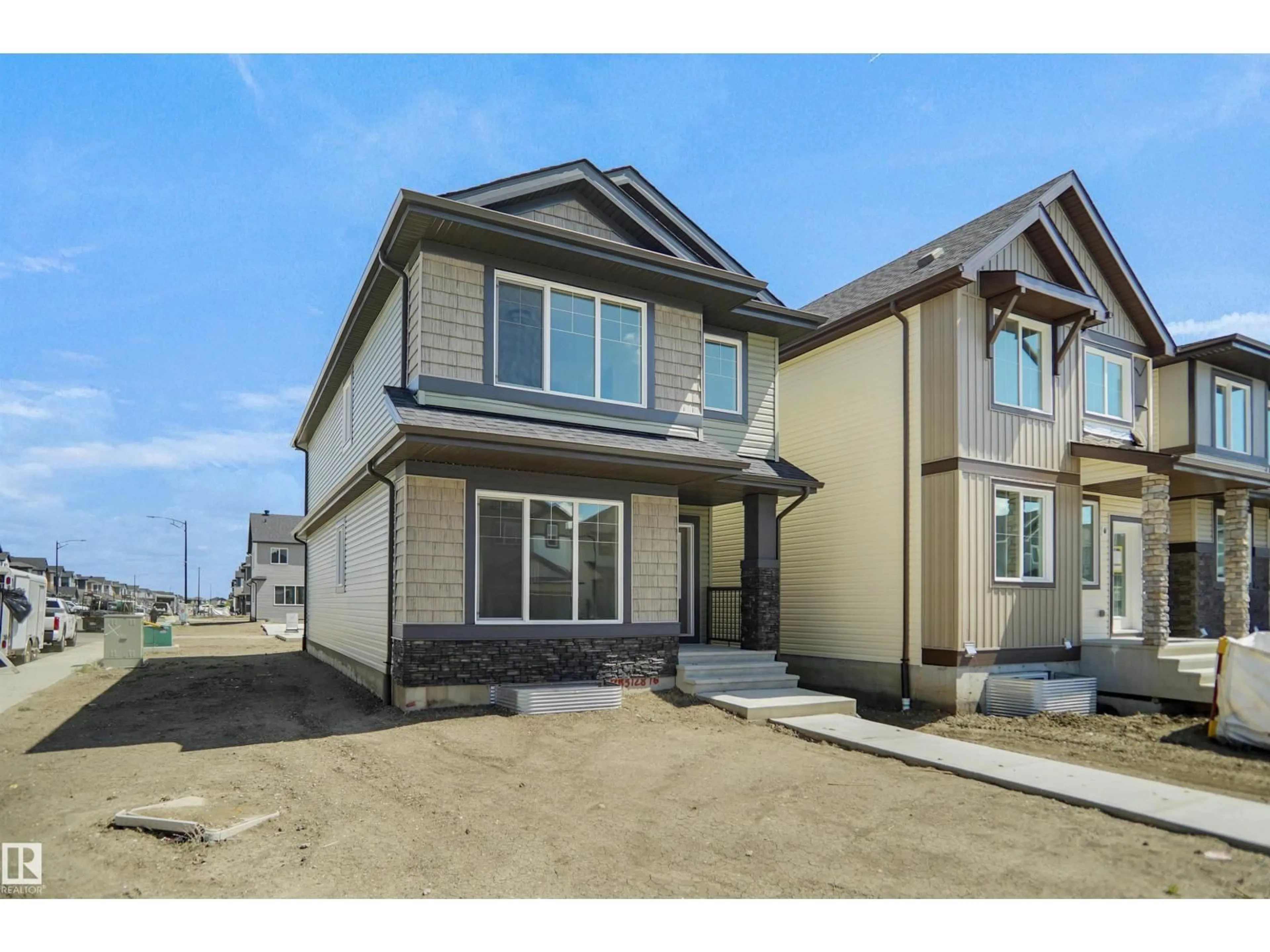Home with vinyl exterior material, street for 546 ASHGROVE CI, Leduc Alberta T9E0K7