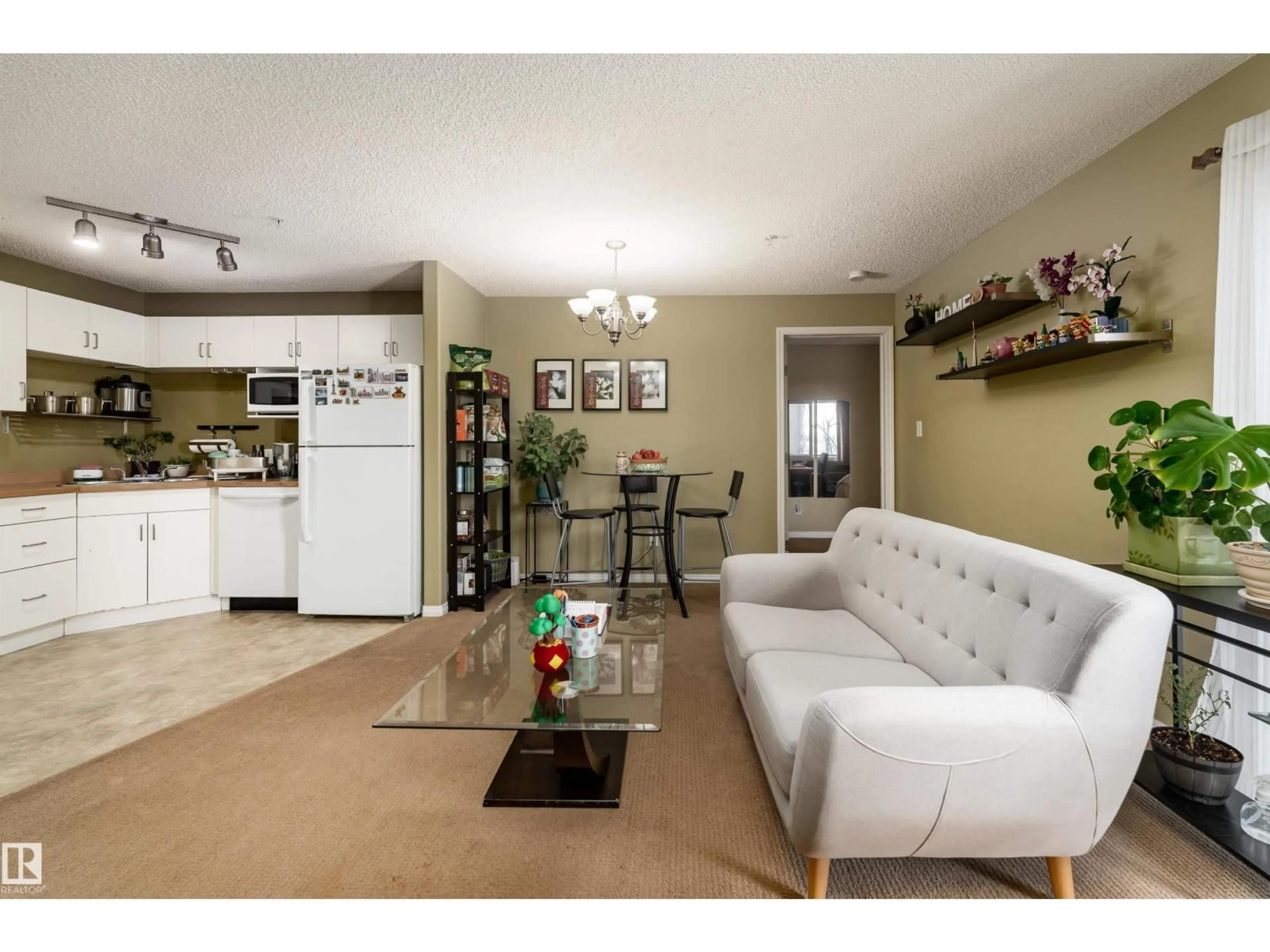 Living room with furniture, unknown for 231 - 11325 83 ST, Edmonton Alberta T5B4W5