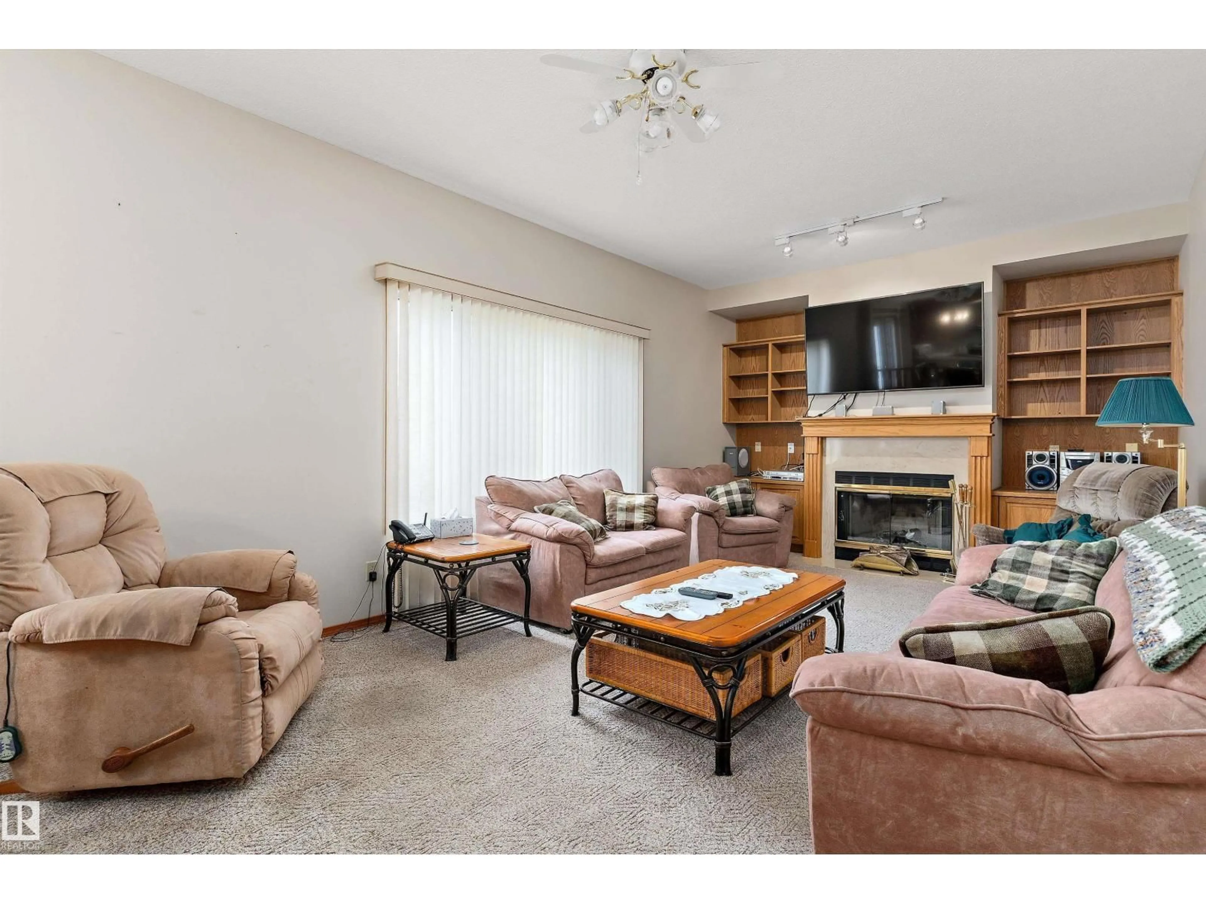 Living room with furniture, unknown for 120 NORTHLAKE LN, Wetaskiwin Alberta T9A3K7