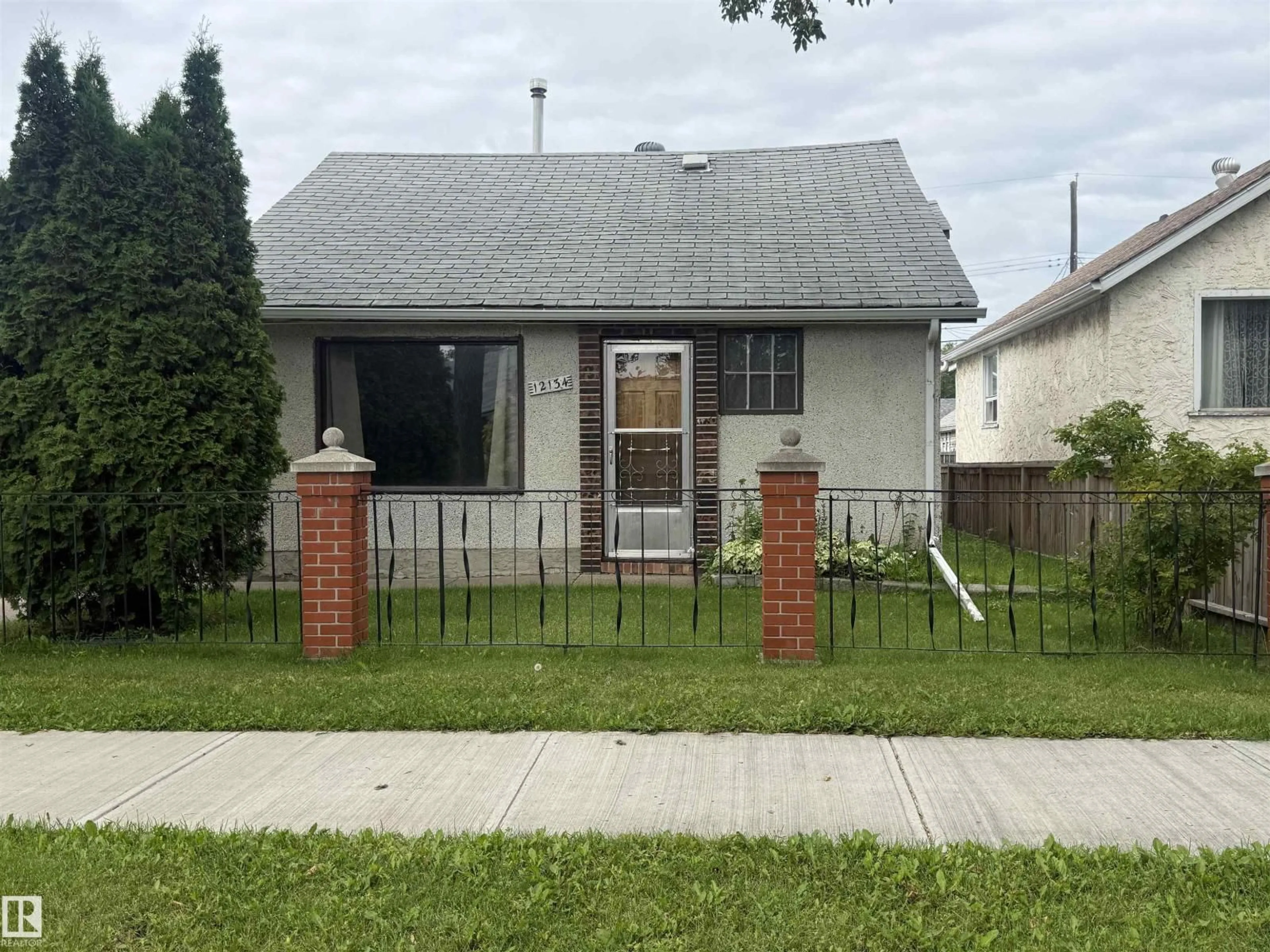 Home with brick exterior material, street for NW - 12134 96 ST, Edmonton Alberta T5G1W1