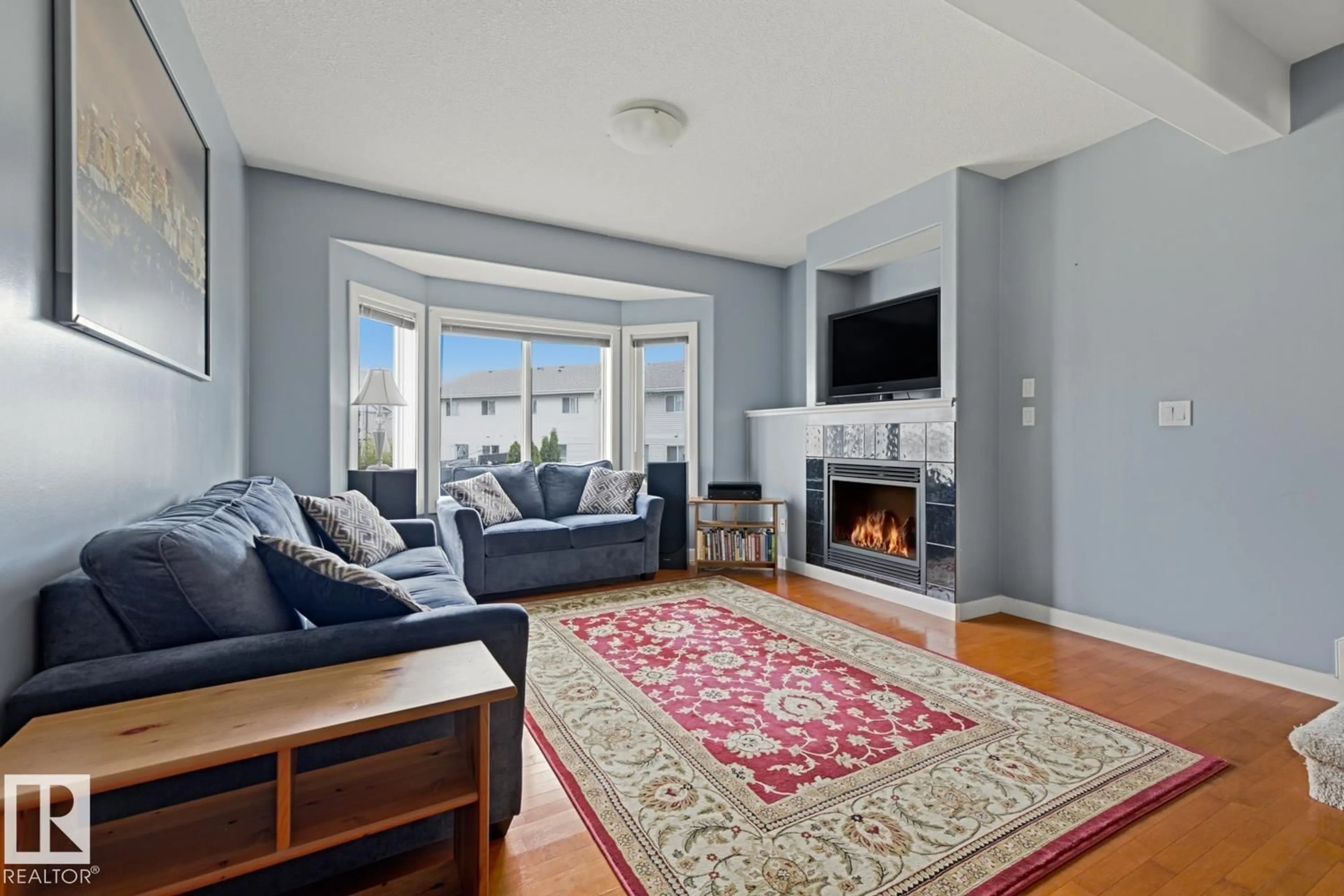 Living room with furniture, unknown for #9 - 13215 153 AV, Edmonton Alberta T6V0B6