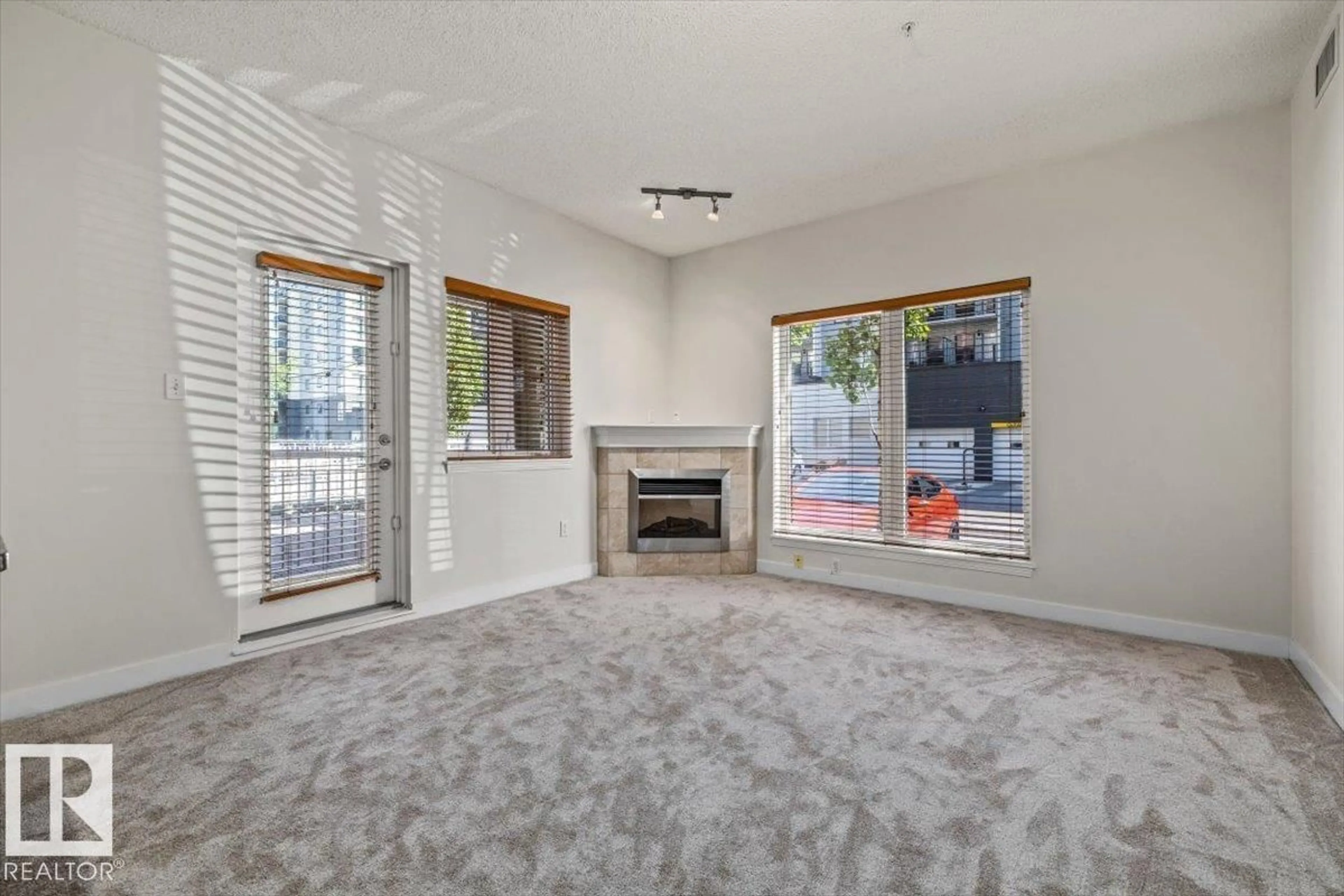 Living room with furniture, unknown for 118 - 10333 112 ST, Edmonton Alberta T5K0B4
