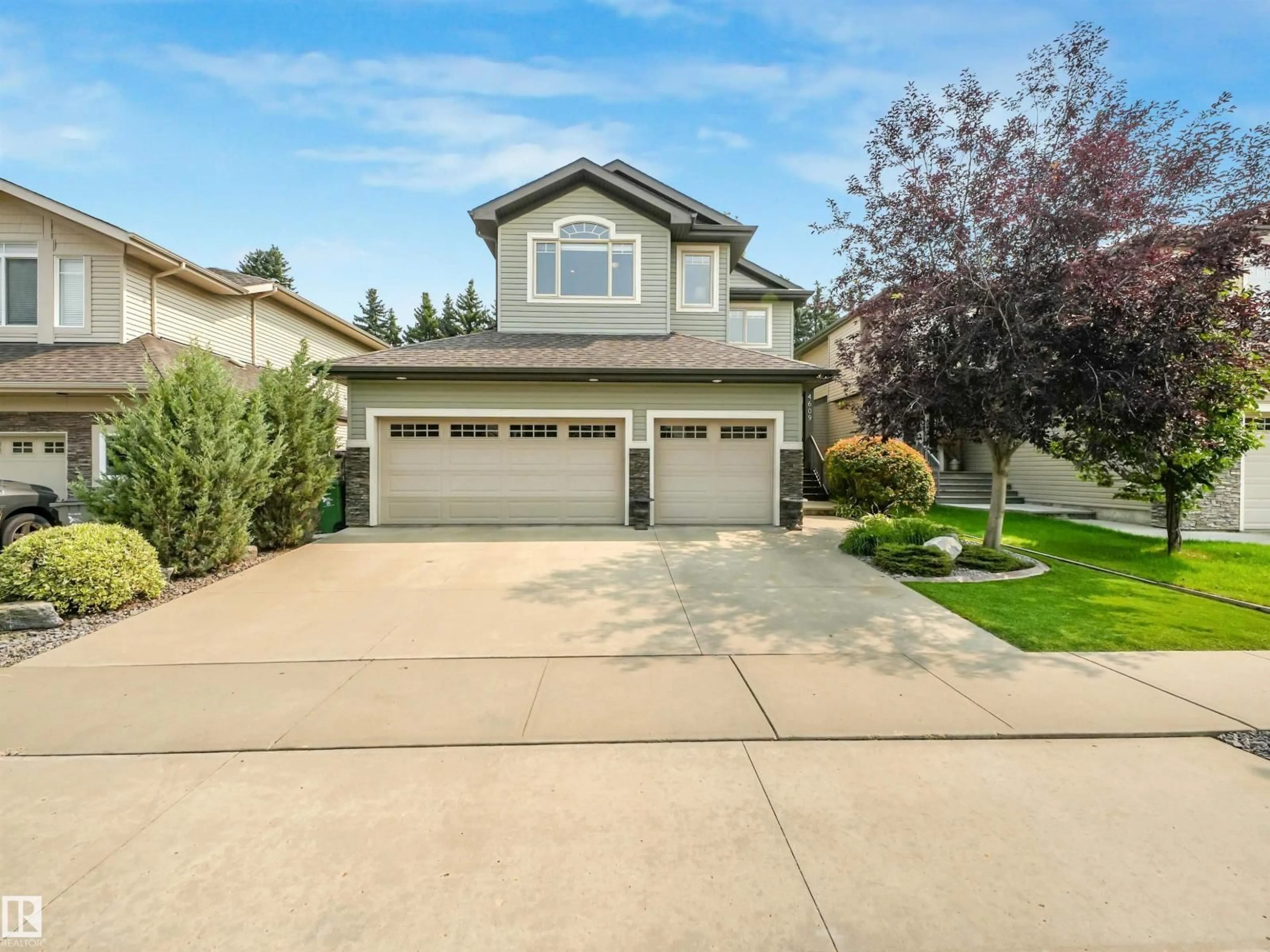 Home with vinyl exterior material, street for 4609 60 ST, Beaumont Alberta T4X0C9