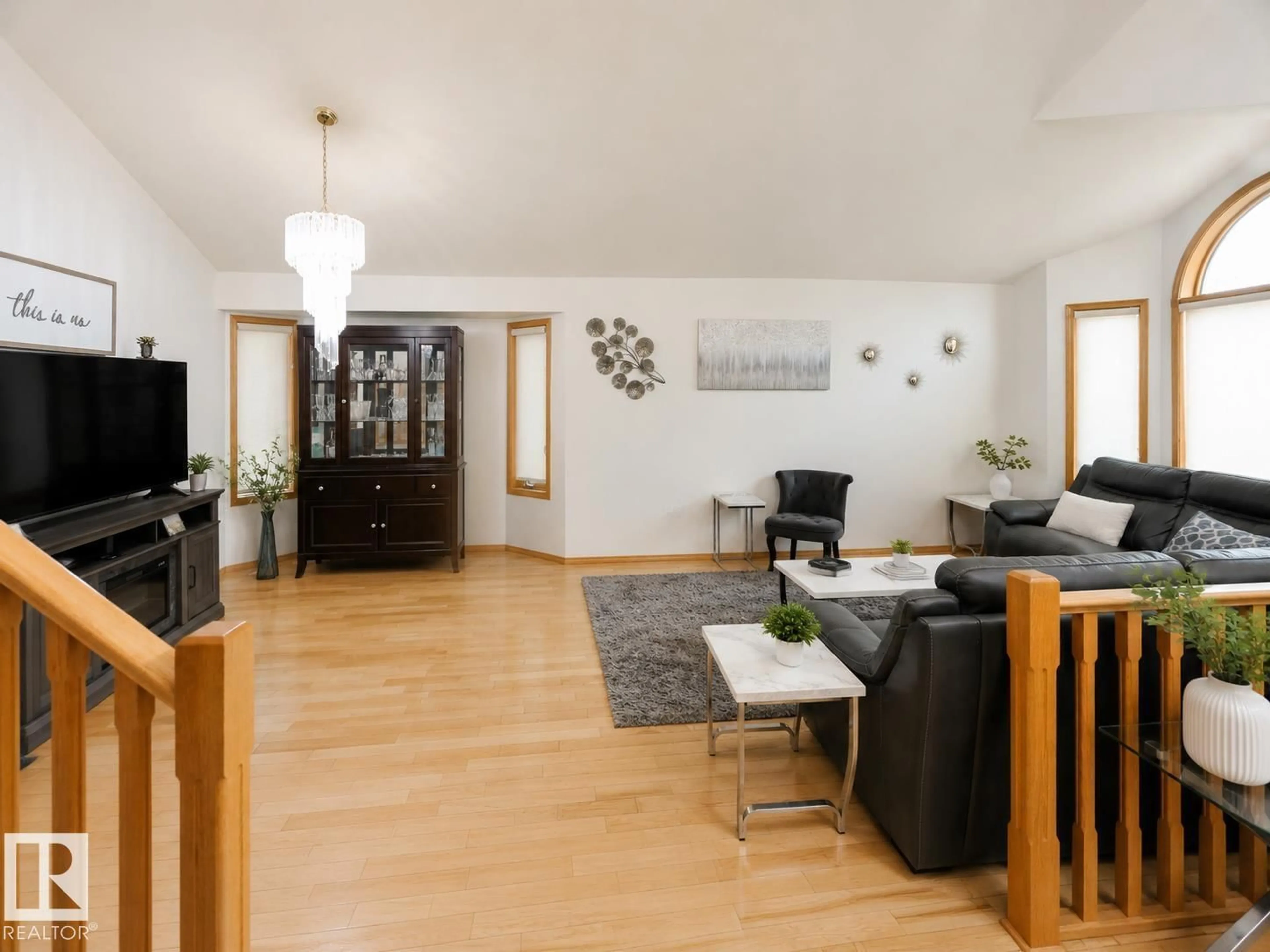 Living room with furniture, wood/laminate floor for 306 TWIN BROOKS DR, Edmonton Alberta T6J6S4