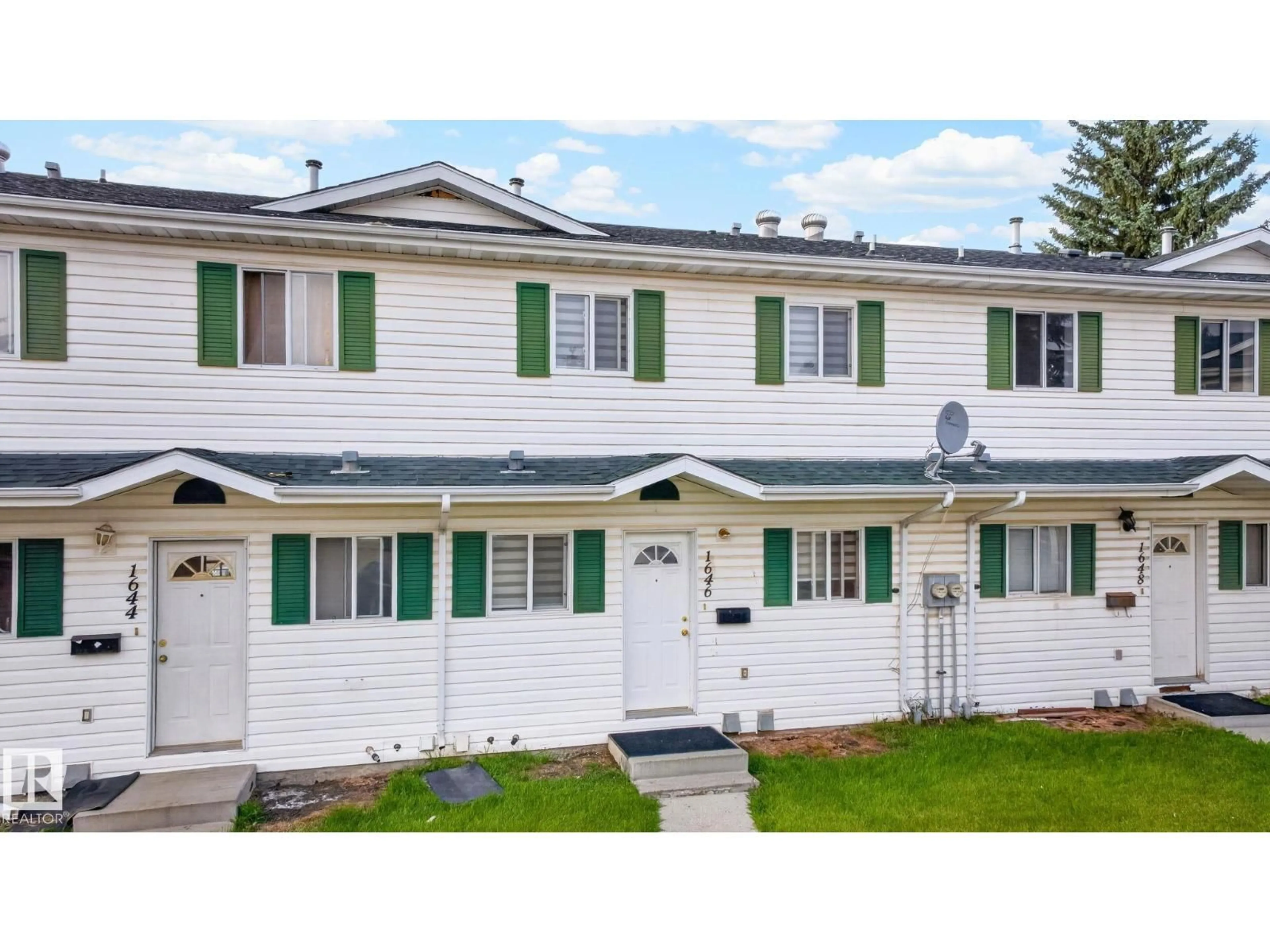 Home with vinyl exterior material, street for 1646 MILLWOODS RD, Edmonton Alberta T6L6W4