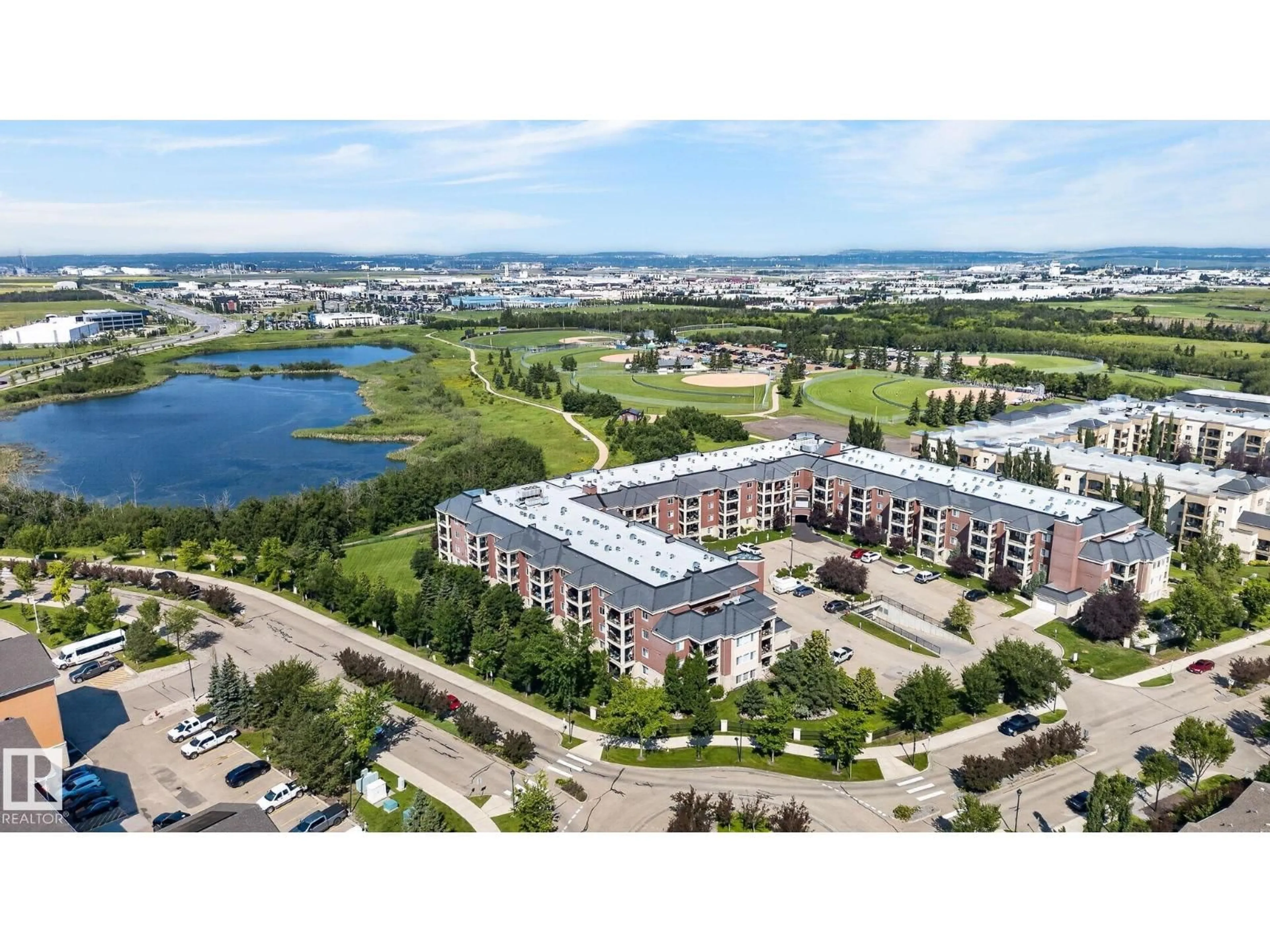 A pic from outside/outdoor area/front of a property/back of a property/a pic from drone, water/lake/river/ocean view for #123 - 300 PALISADES WAY, Sherwood Park Alberta T8H2T9