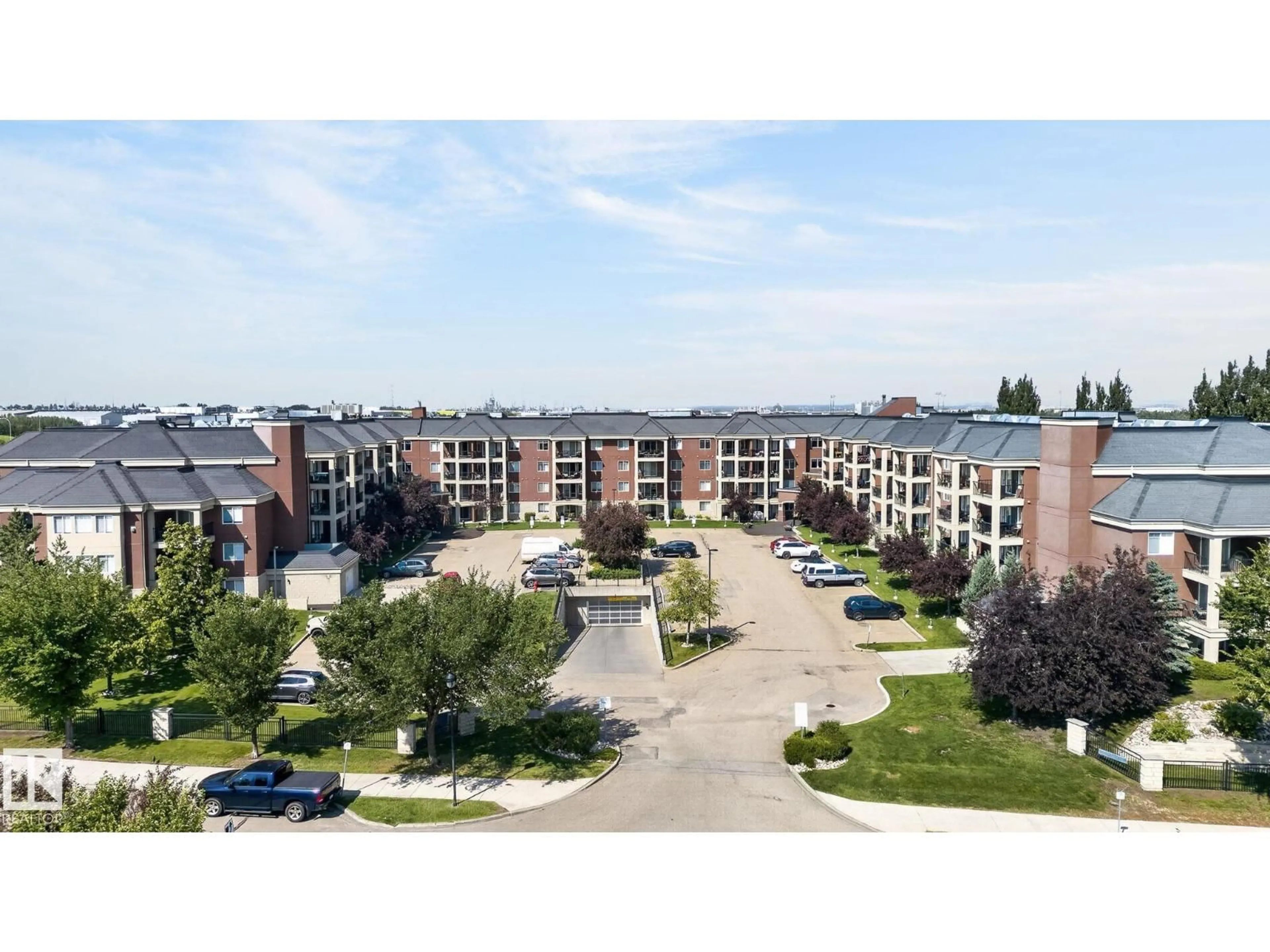A pic from outside/outdoor area/front of a property/back of a property/a pic from drone, city buildings view from balcony for #123 - 300 PALISADES WAY, Sherwood Park Alberta T8H2T9