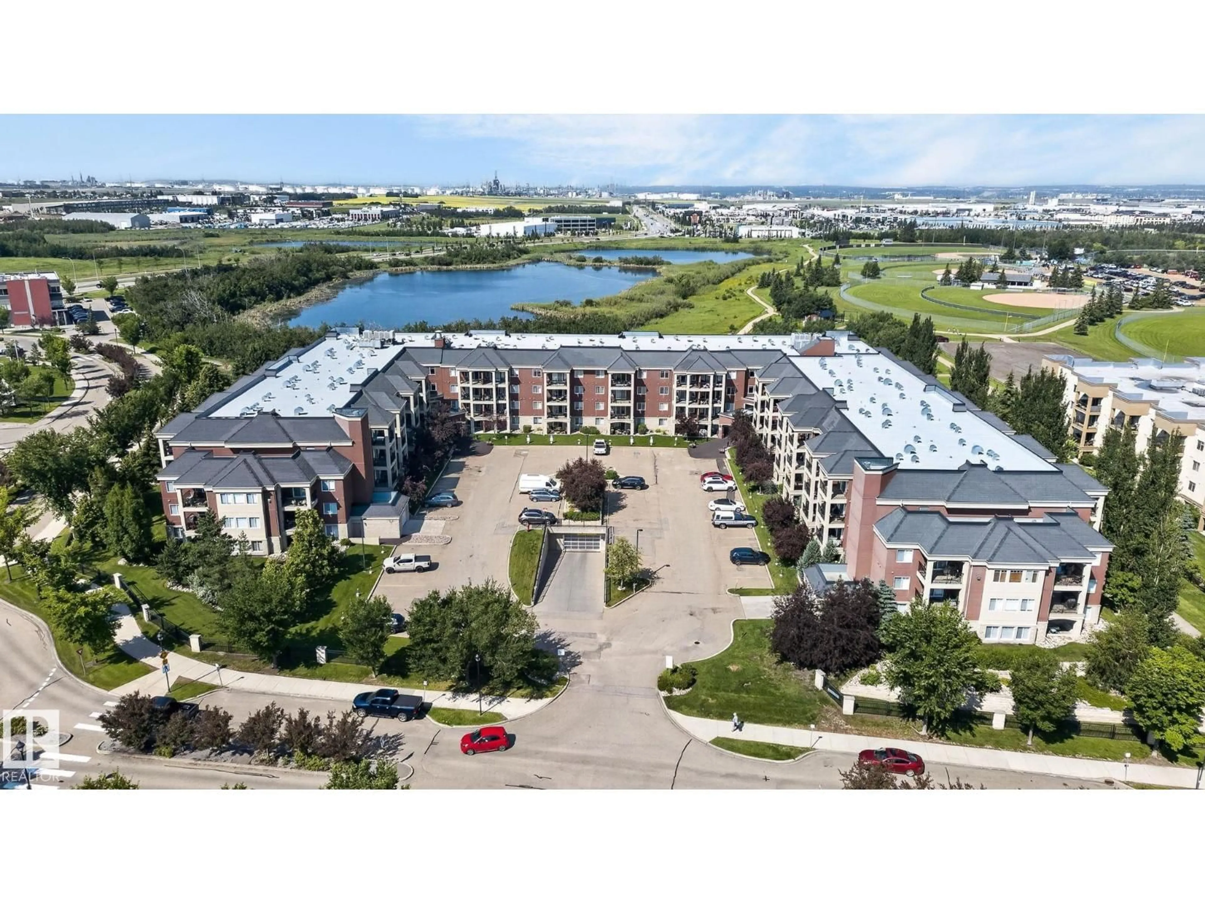 A pic from outside/outdoor area/front of a property/back of a property/a pic from drone, water/lake/river/ocean view for #123 - 300 PALISADES WAY, Sherwood Park Alberta T8H2T9