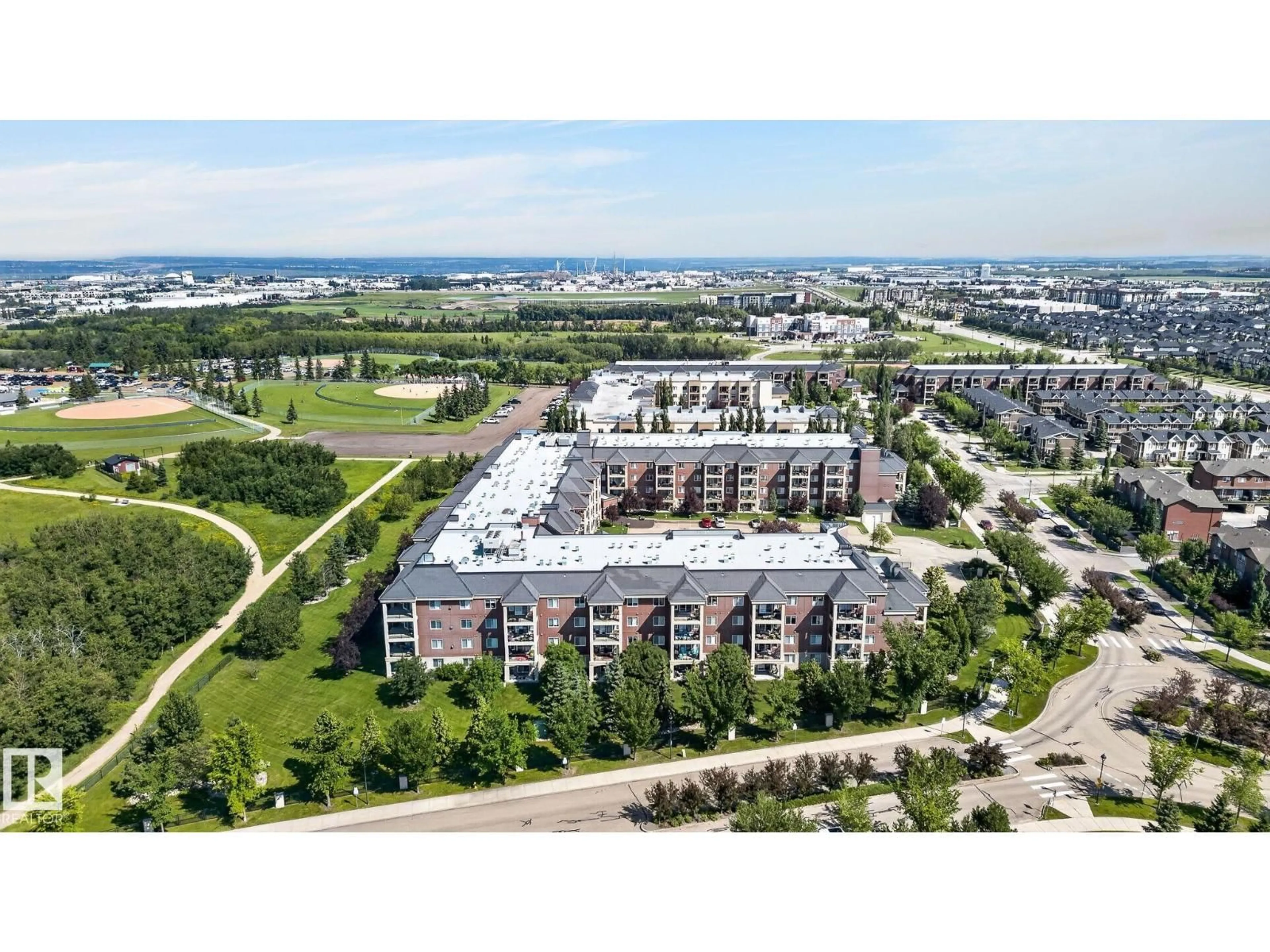A pic from outside/outdoor area/front of a property/back of a property/a pic from drone, unknown for #123 - 300 PALISADES WAY, Sherwood Park Alberta T8H2T9