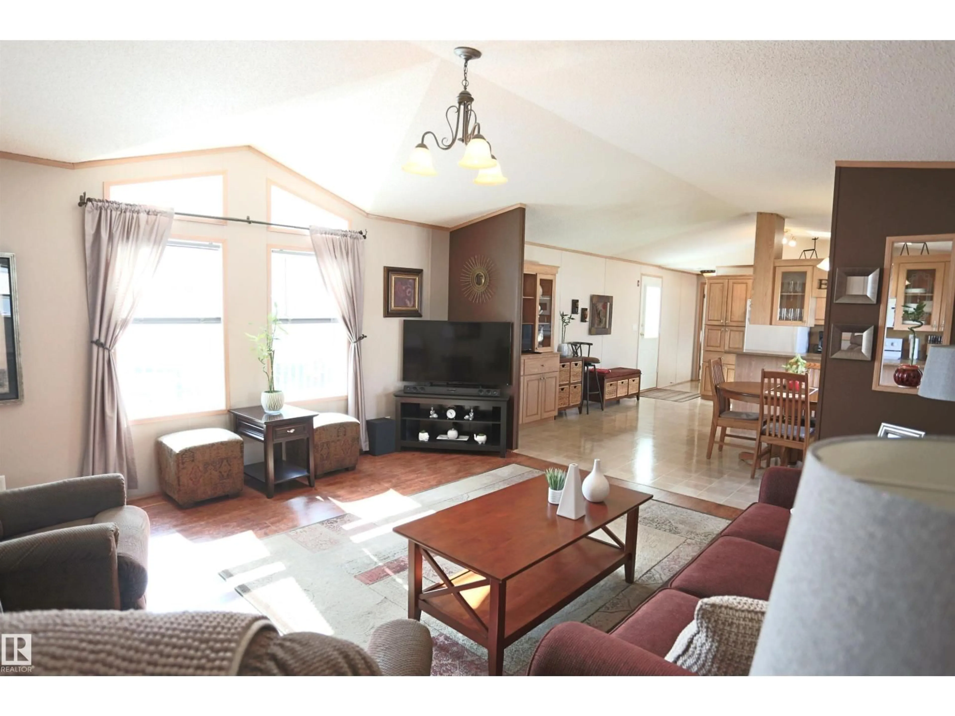 Living room with furniture, unknown for 53222 - 1214 RR 272, Rural Parkland County Alberta T7X4K4
