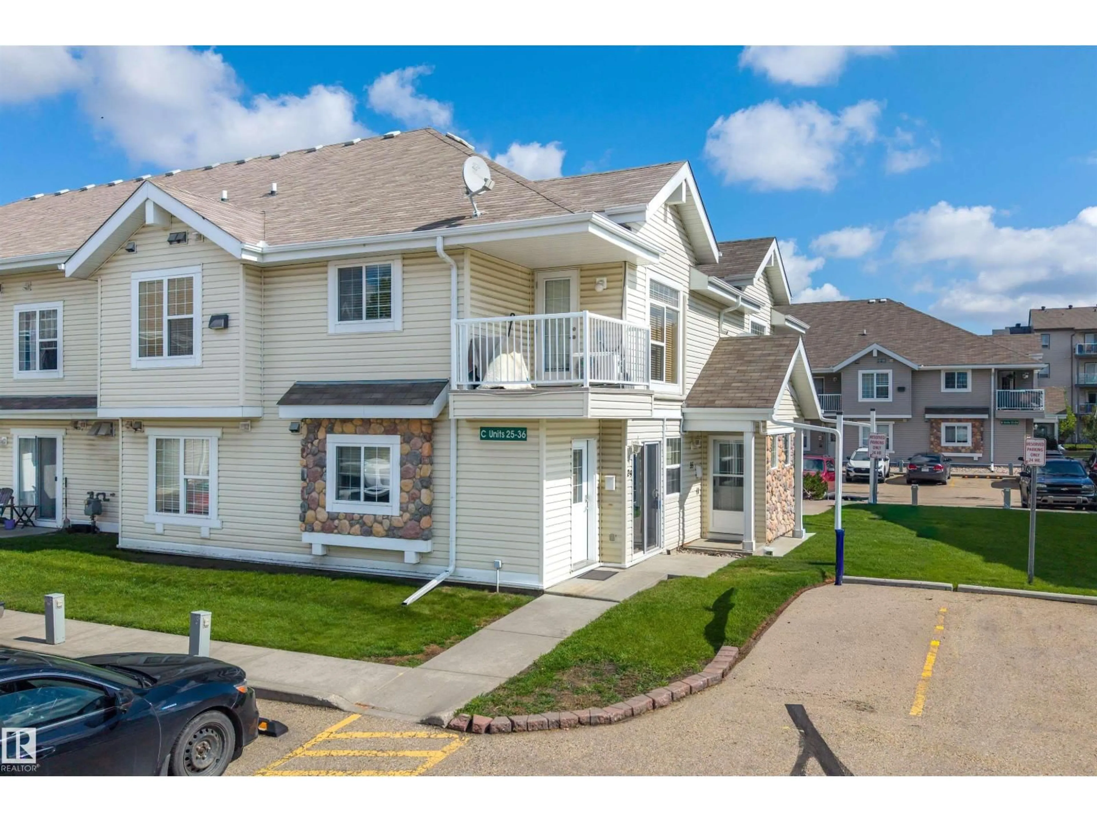 A pic from outside/outdoor area/front of a property/back of a property/a pic from drone, street for 150 - 29 EDWARDS DR, Edmonton Alberta T6X1M4