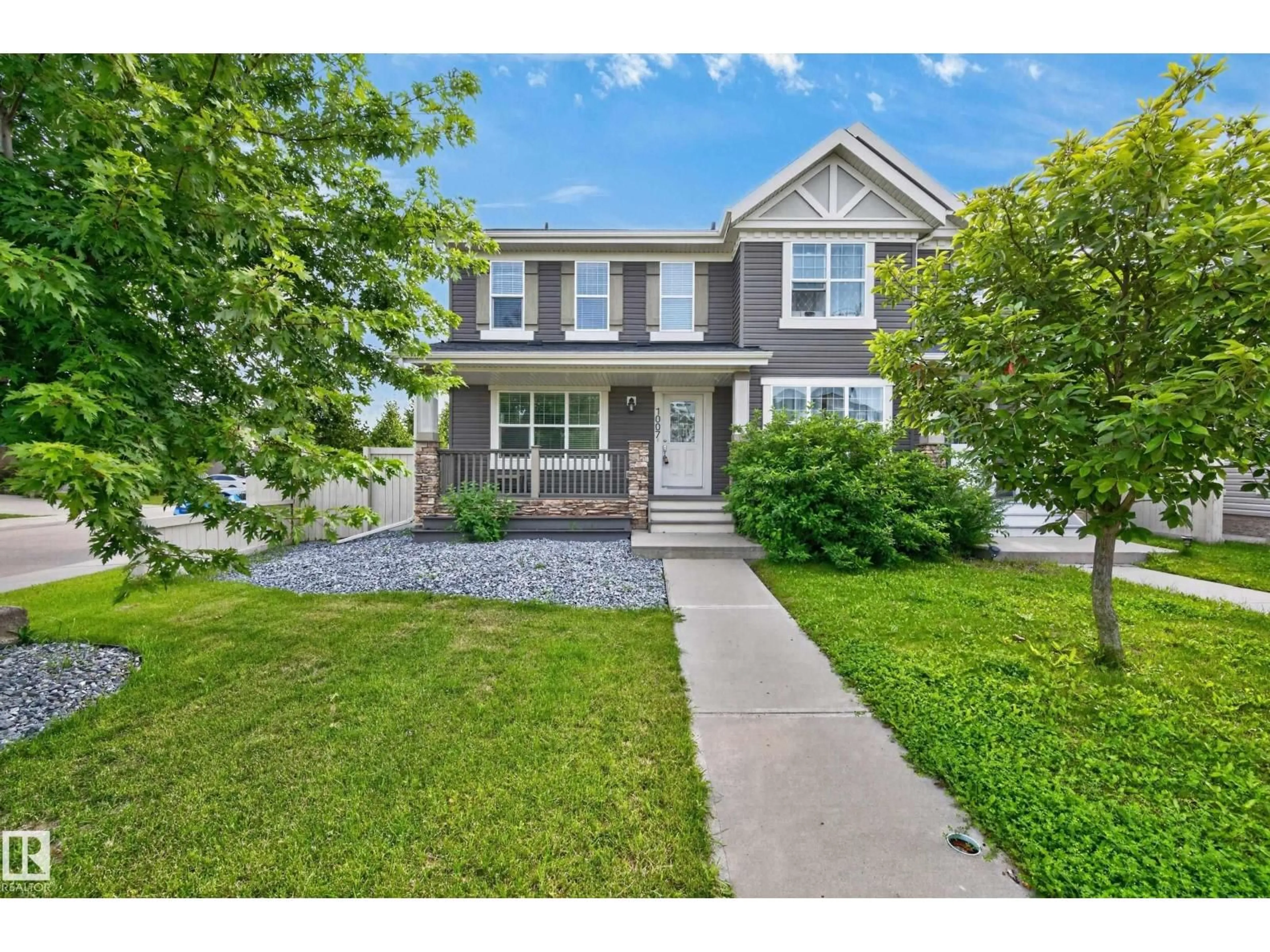 Home with vinyl exterior material, street for SW - 1007 162 ST, Edmonton Alberta T6W2G9