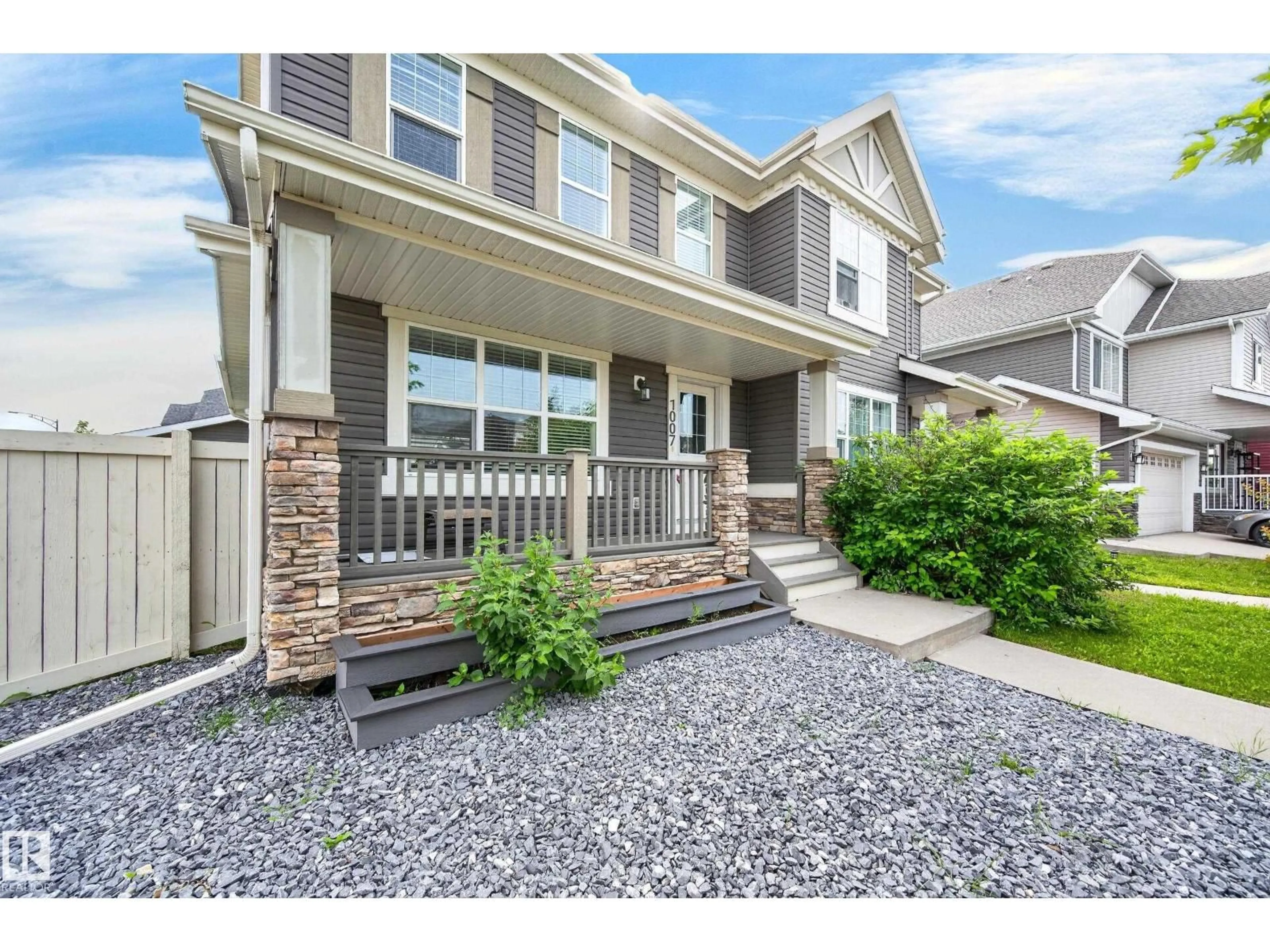 Home with vinyl exterior material, street for SW - 1007 162 ST, Edmonton Alberta T6W2G9