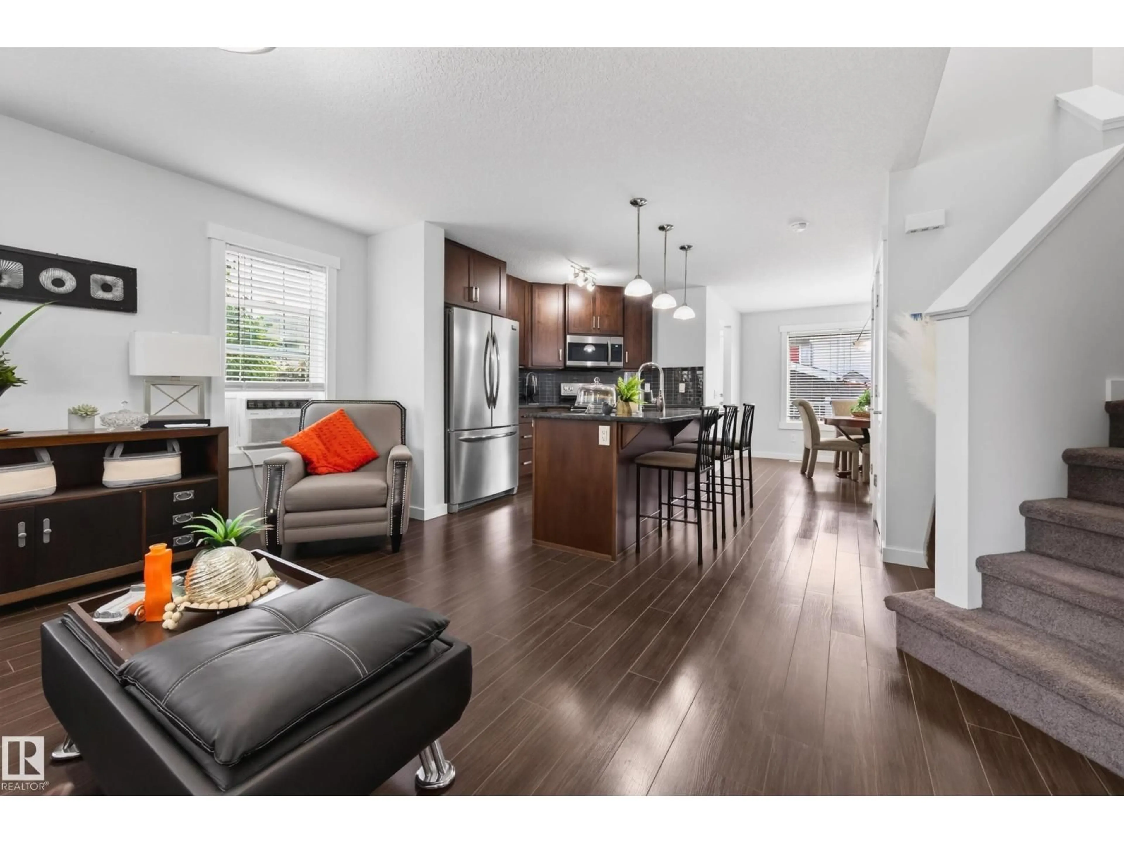 Open concept kitchen, wood/laminate floor for SW - 1007 162 ST, Edmonton Alberta T6W2G9