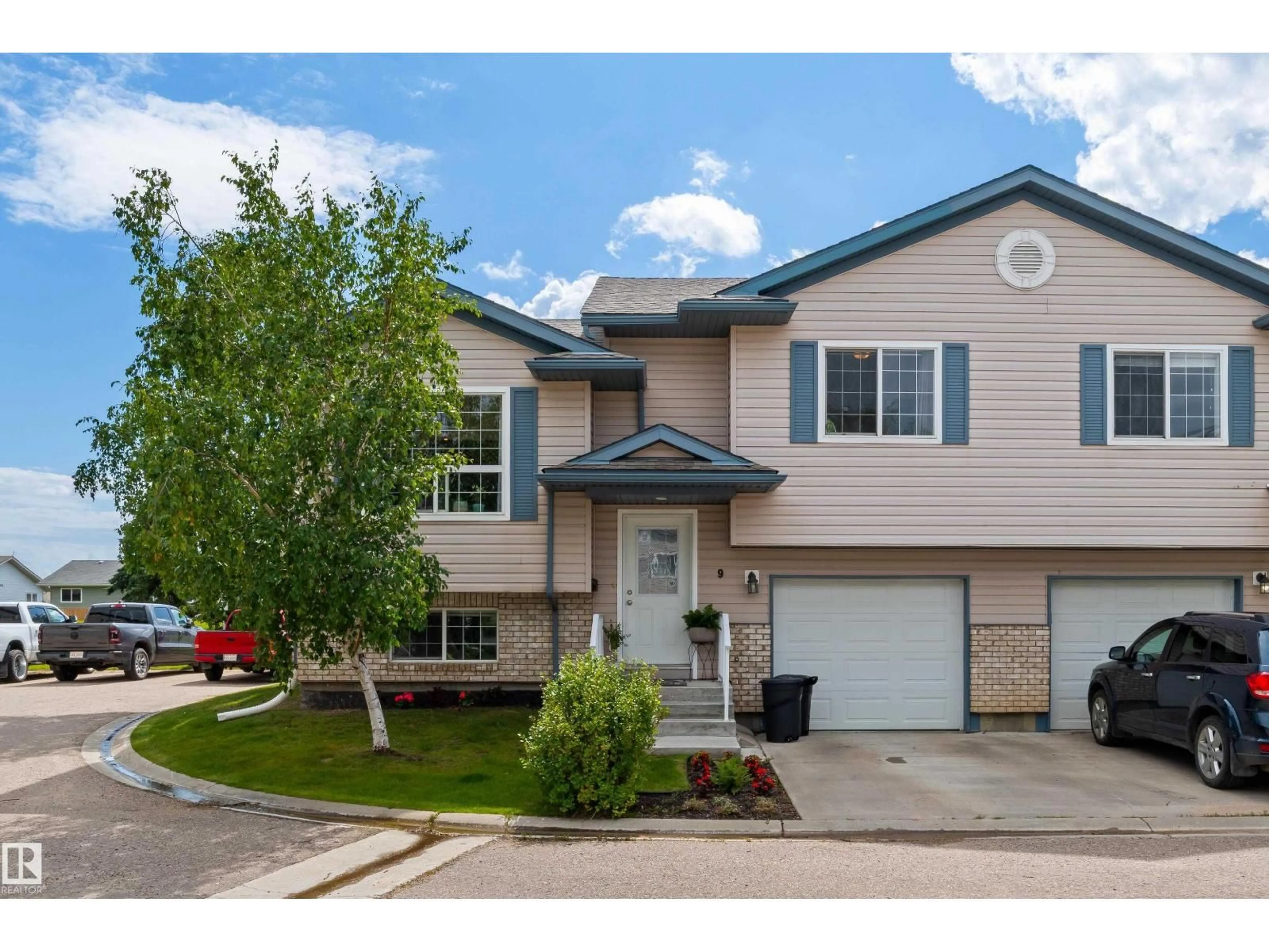 Home with vinyl exterior material, street for #9 - 6506 47 ST, Cold Lake Alberta T9M0C5