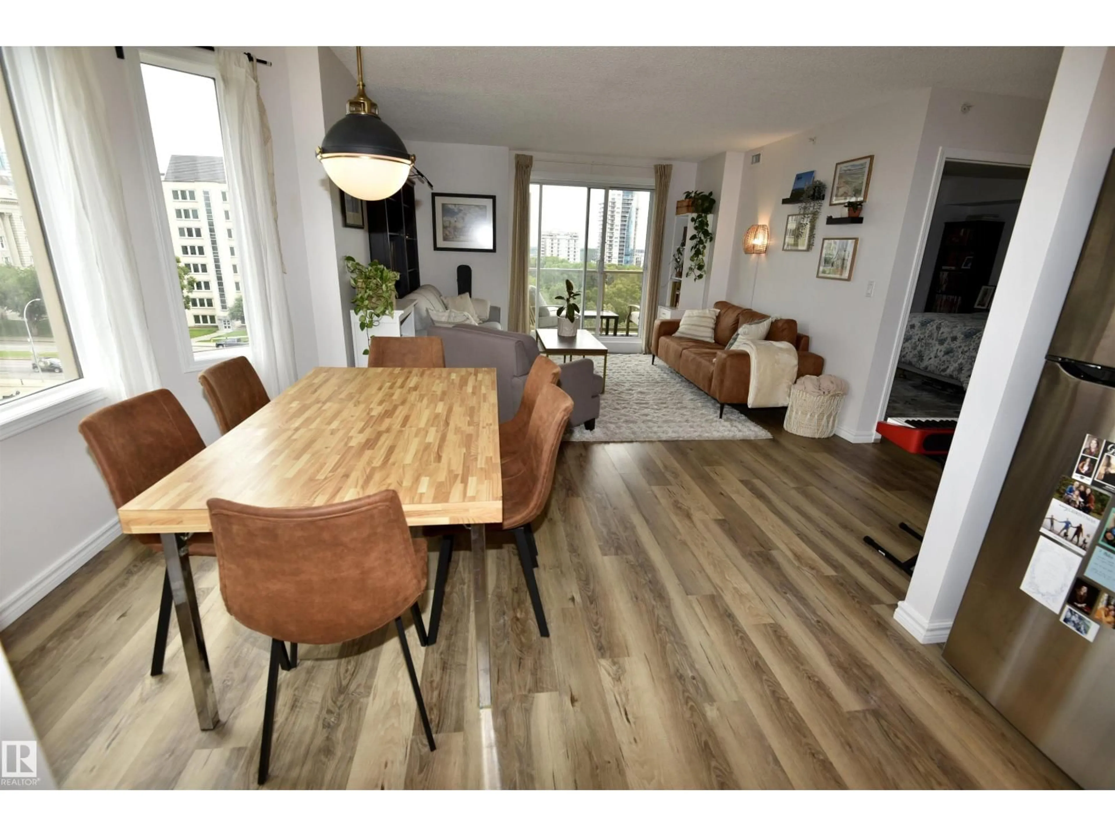 Dining room, wood/laminate floor for 701 - 9741 110 ST, Edmonton Alberta T5K2Y8