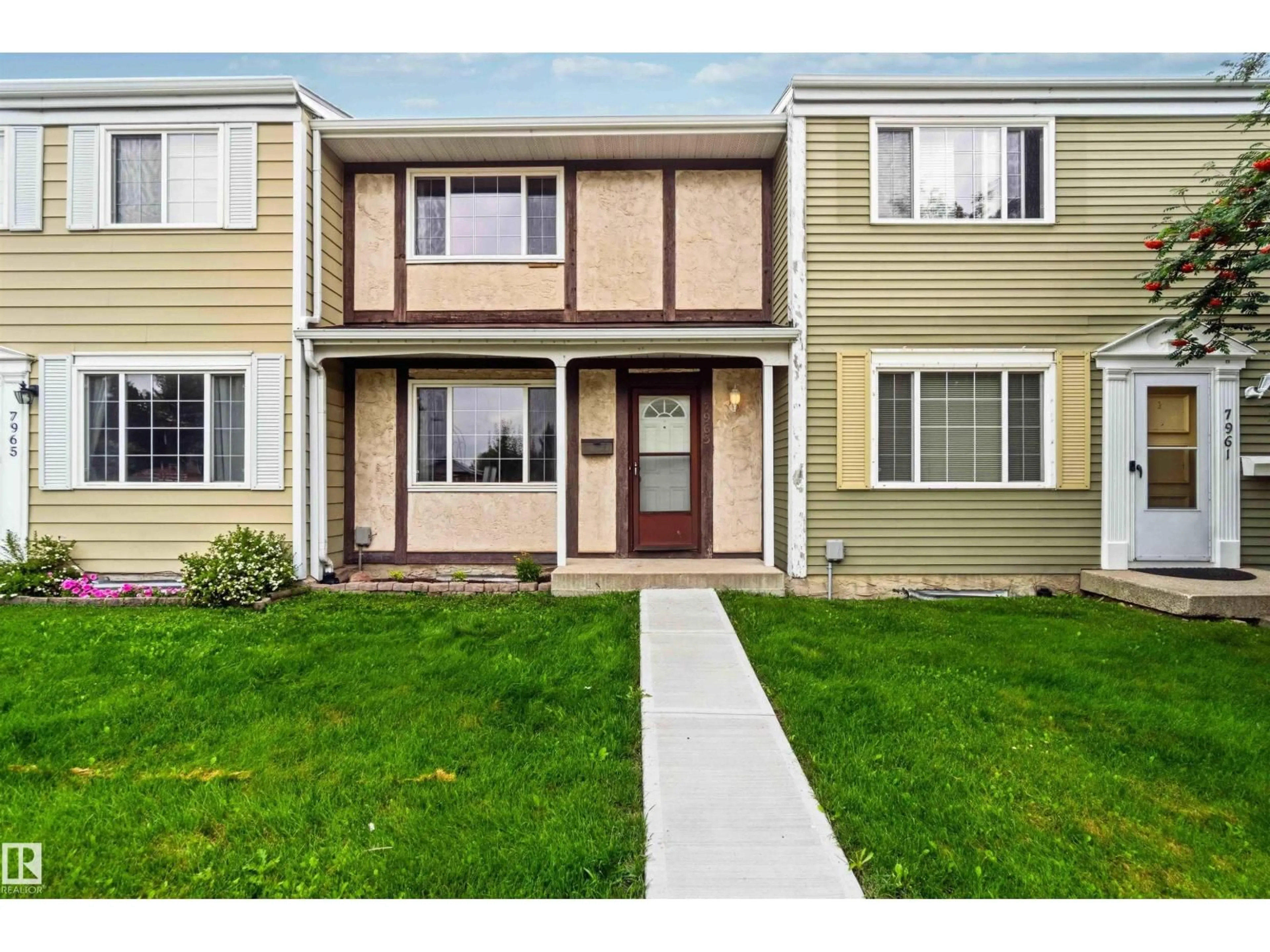 Home with vinyl exterior material, street for 7963 178 ST, Edmonton Alberta T5T1L3