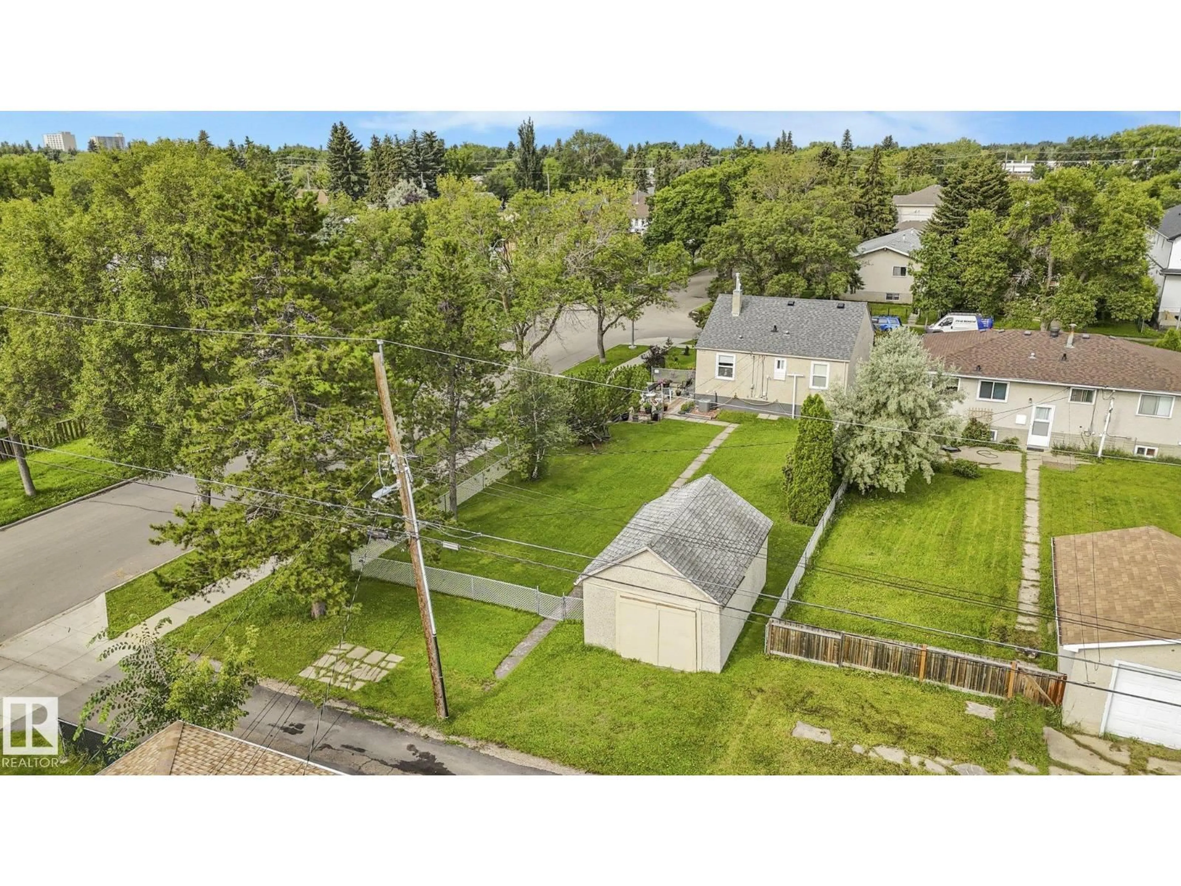 A pic from outside/outdoor area/front of a property/back of a property/a pic from drone, street for 12203 126 ST, Edmonton Alberta T5L0W9