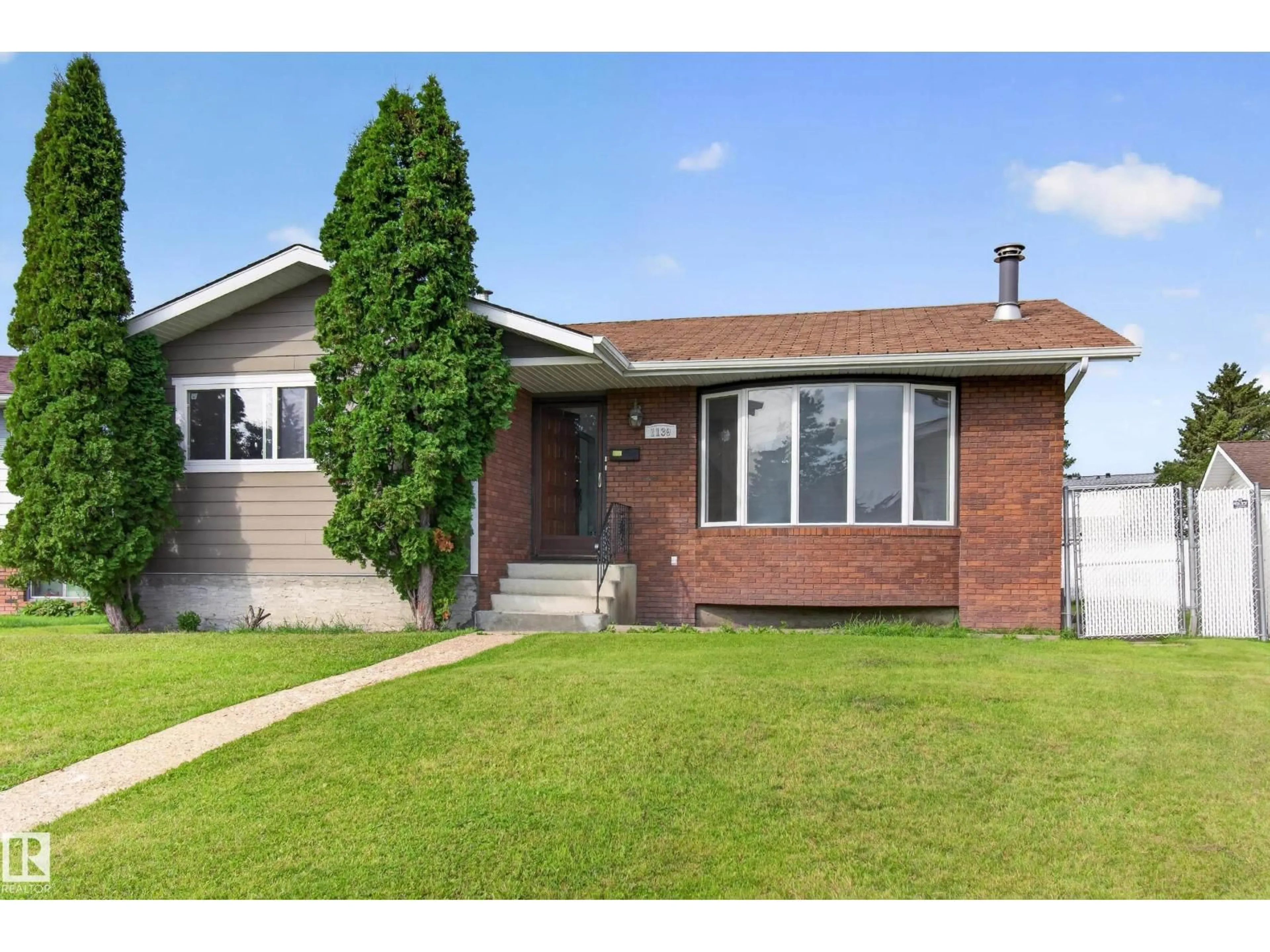 Home with brick exterior material, street for 1139 LAKEWOOD RD, Edmonton Alberta T6K3A9
