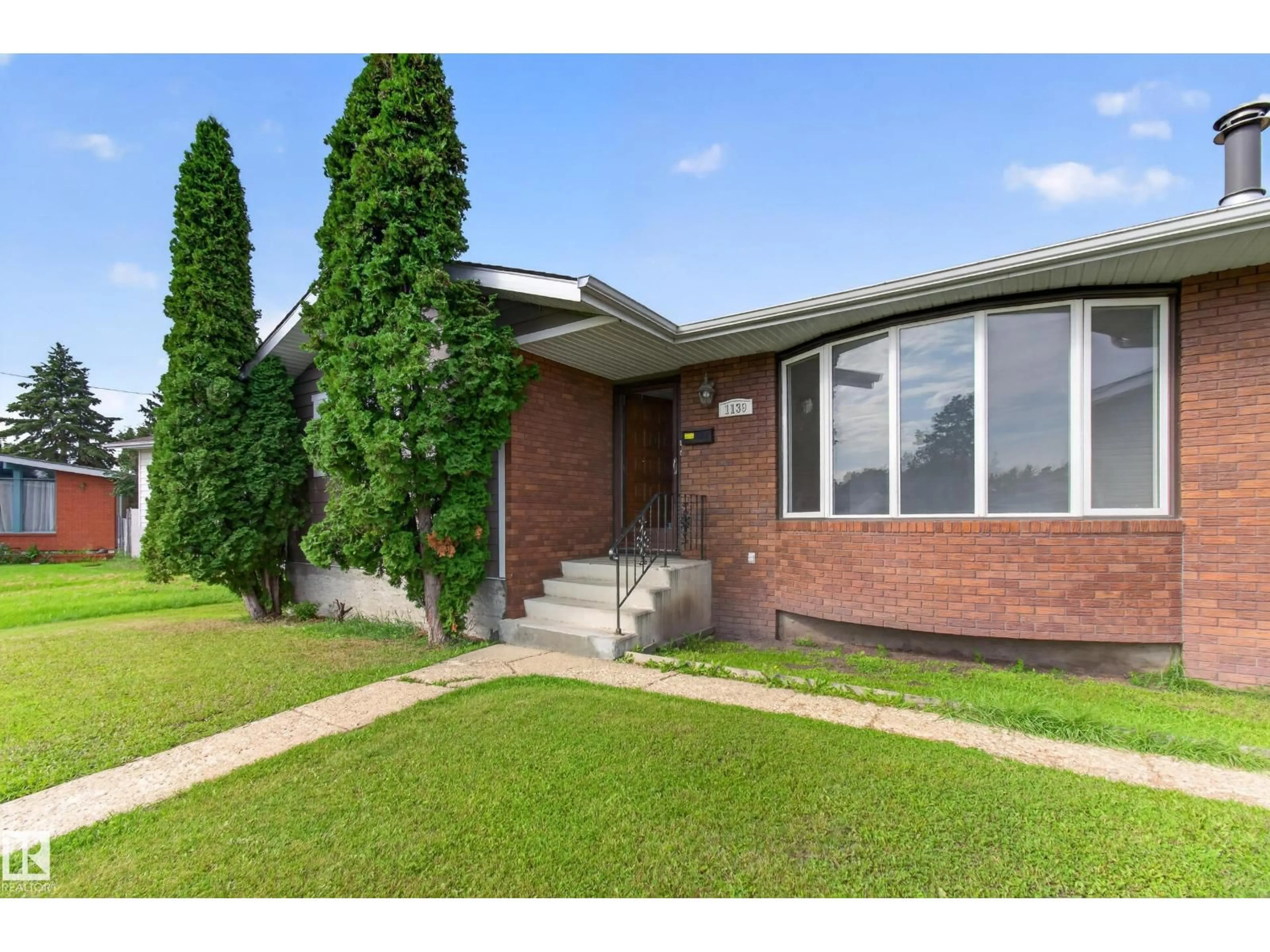 Home with brick exterior material, street for 1139 LAKEWOOD RD, Edmonton Alberta T6K3A9