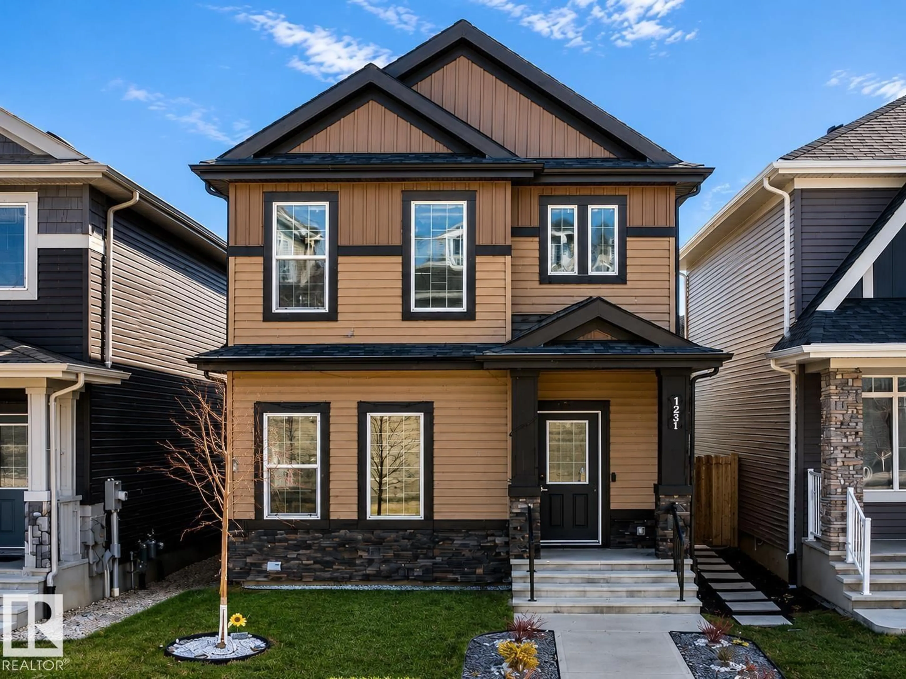 Home with brick exterior material, street for 1231 WATT DR, Edmonton Alberta T6X2H2