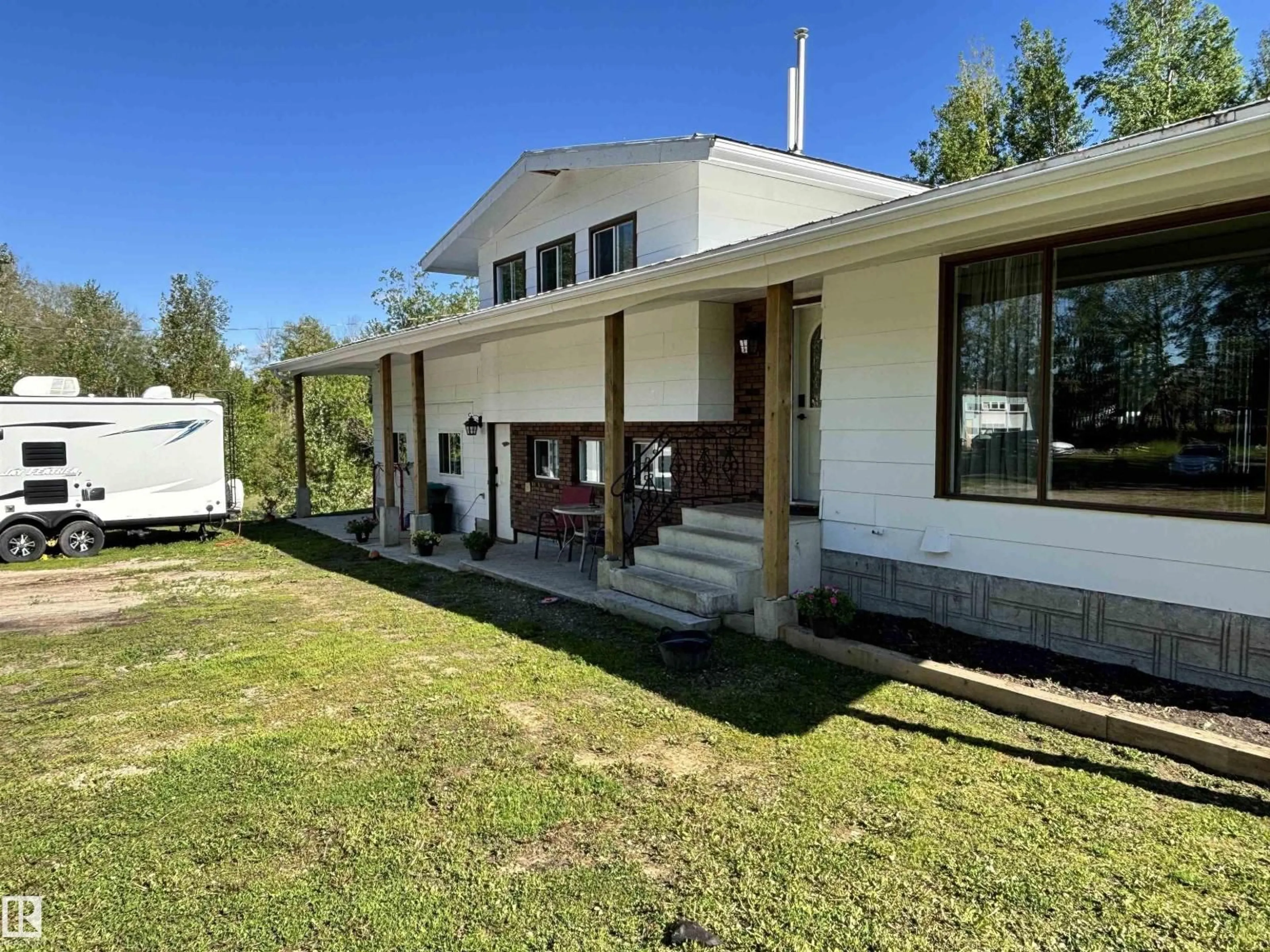 A pic from outside/outdoor area/front of a property/back of a property/a pic from drone, unknown for 53513 HWY 765, Rural Lac Ste. Anne County Alberta T0E0L0