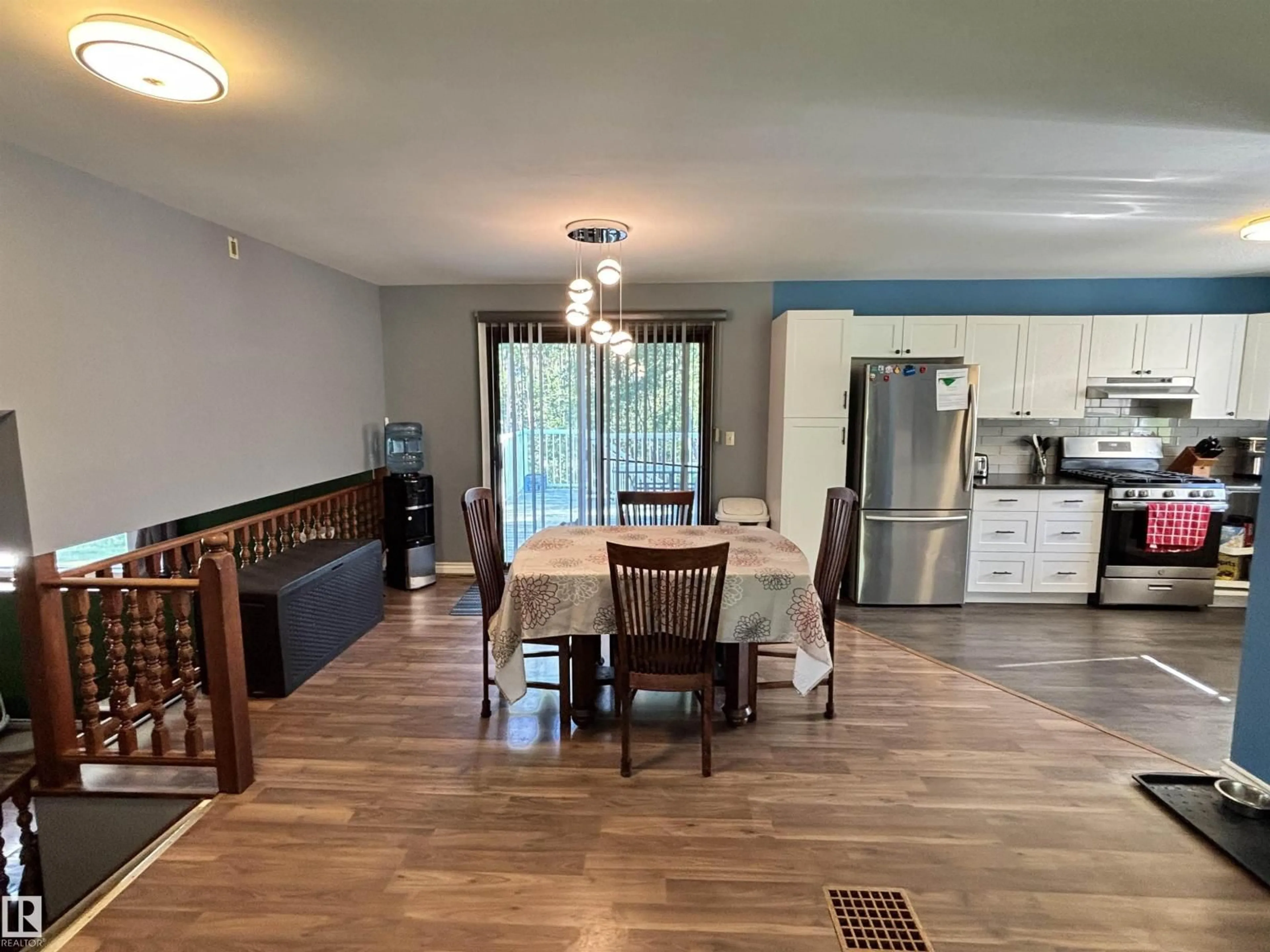 Open concept kitchen, wood/laminate floor for 53513 HWY 765, Rural Lac Ste. Anne County Alberta T0E0L0