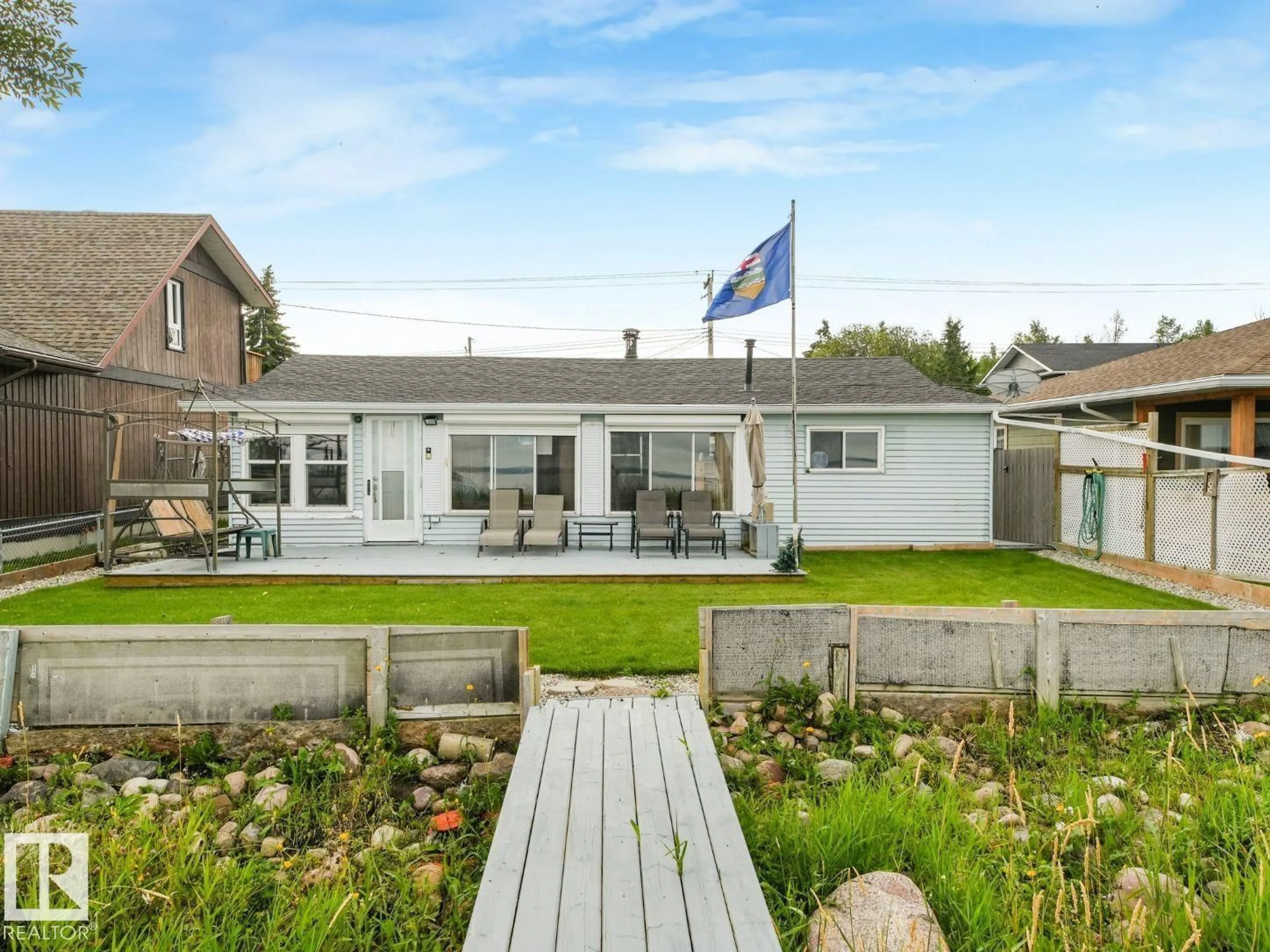 A pic from outside/outdoor area/front of a property/back of a property/a pic from drone, street for 5811 51 AV, Rural Lac Ste. Anne County Alberta T0E0A0