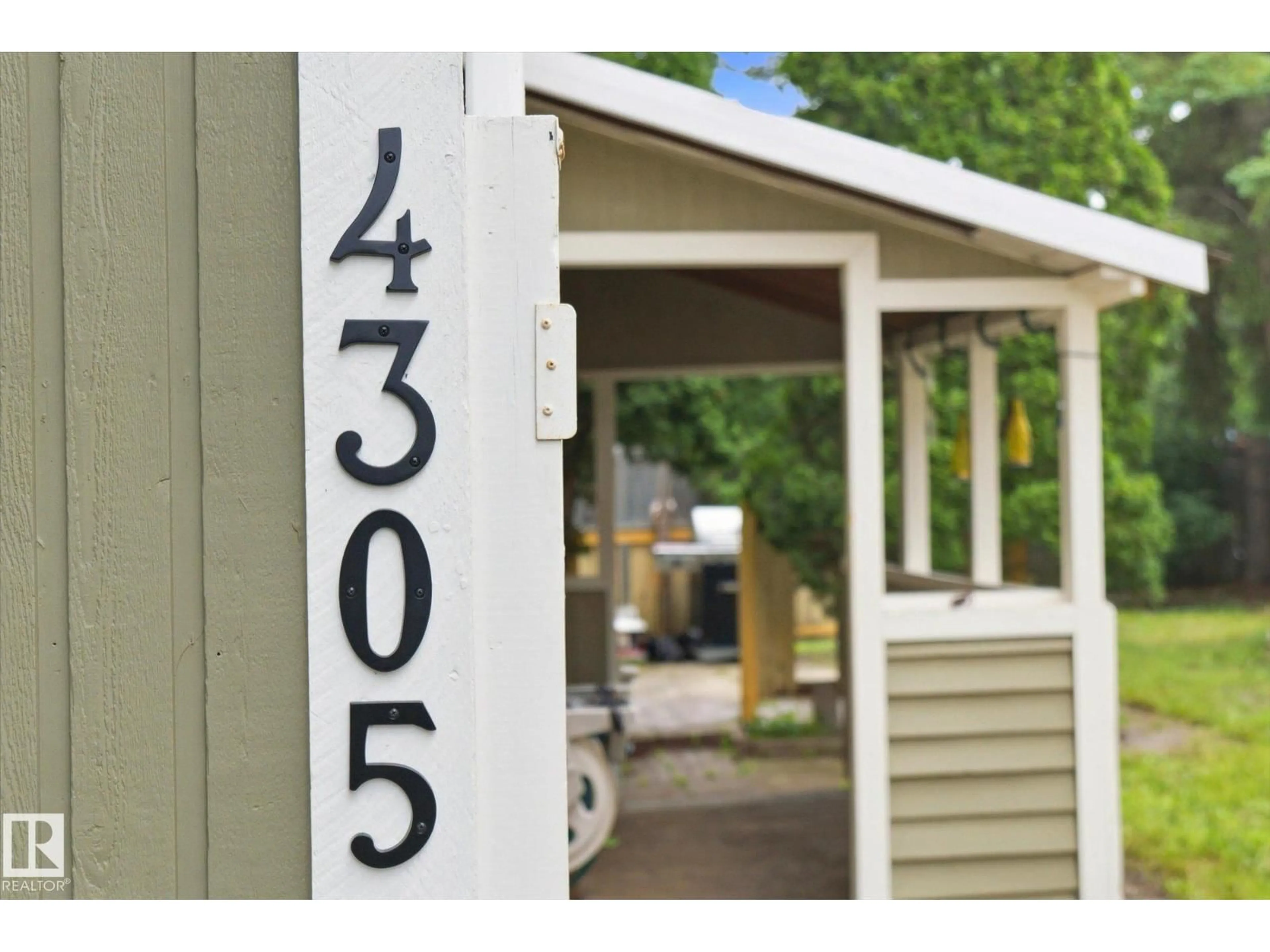 Home with vinyl exterior material, street for NW - 4305 35 ST, Edmonton Alberta T6L5J6